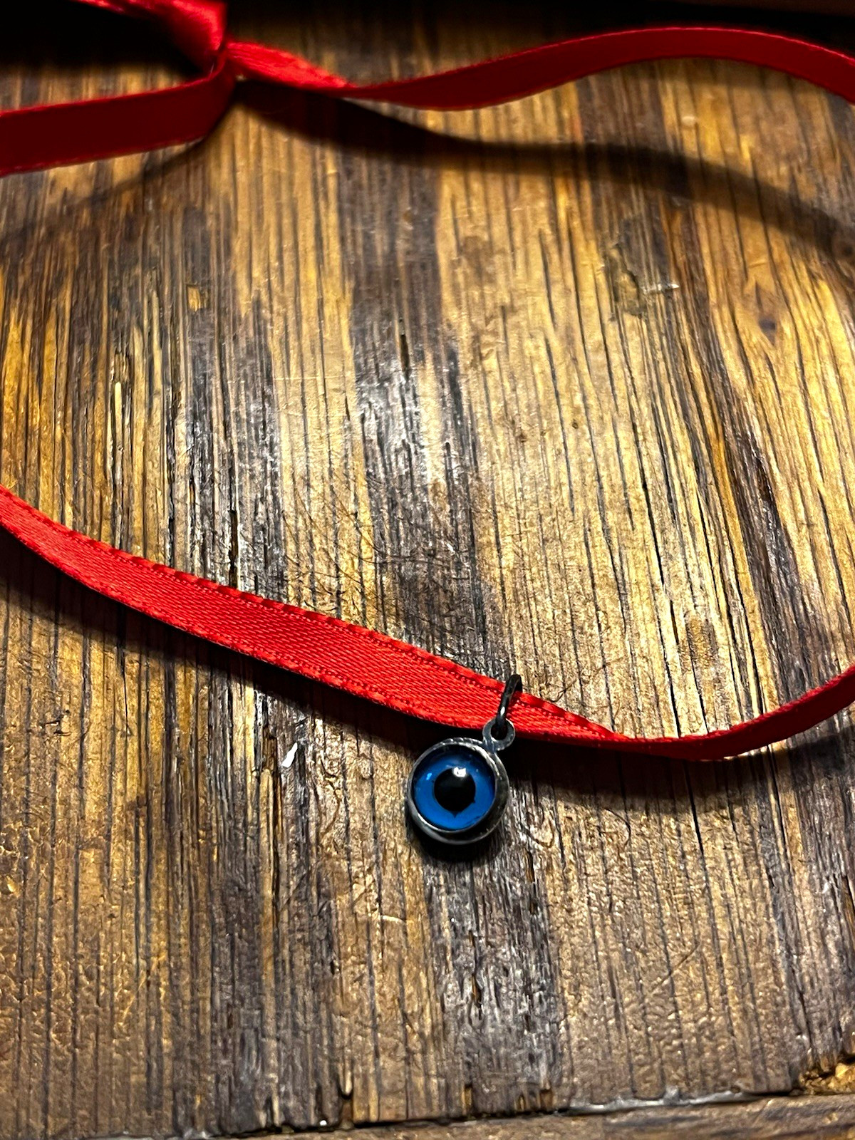 Red Ribbon bracelet with Blue Round Evil Eye Charm Pendant