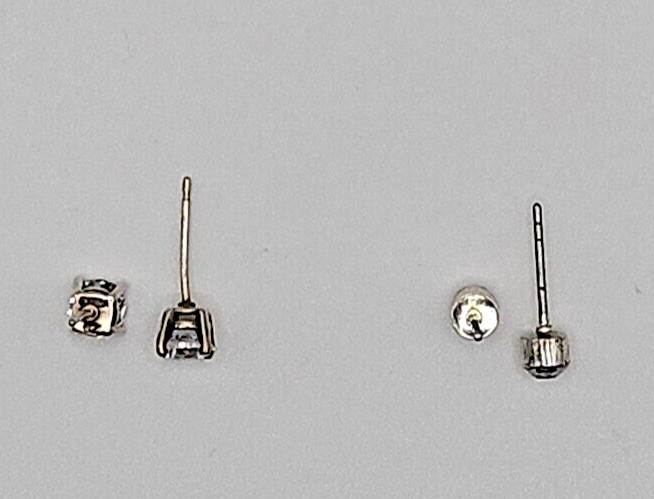 2 sets of cubic zirconia stud earrings. See Pictures & Description!! Pre loved