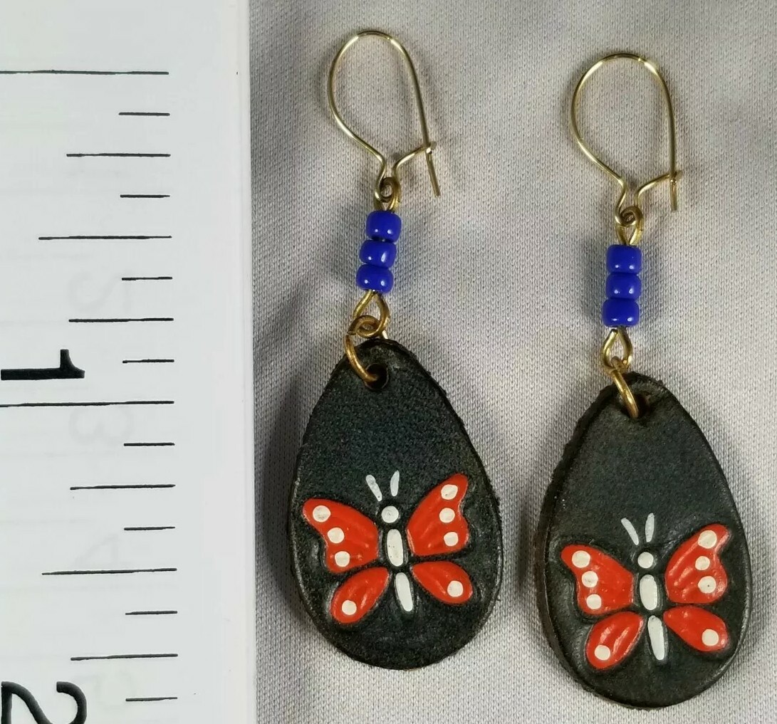Beautiful light pressed leather butterfly pierced earrings