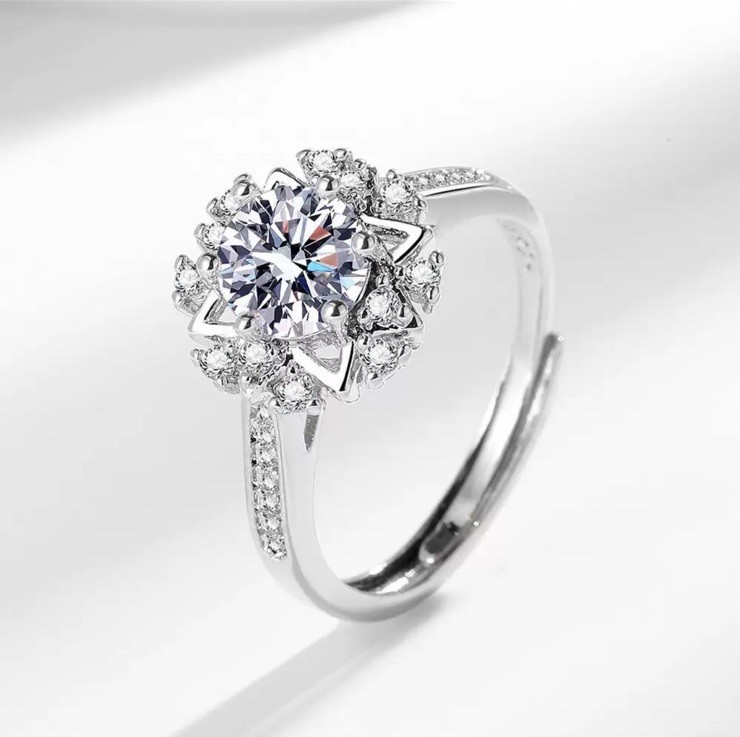 One-carat simulated diamond, 6.5mm main stone, open Size.