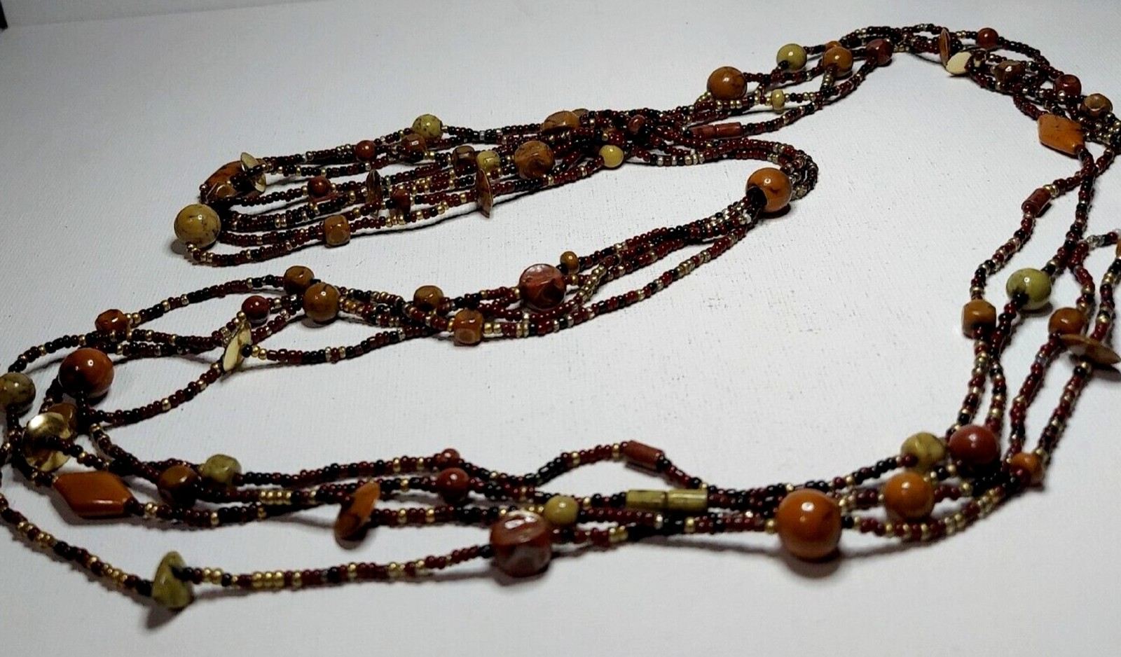 Vintage Necklace 4-strand Varied sizes and color beads 34″