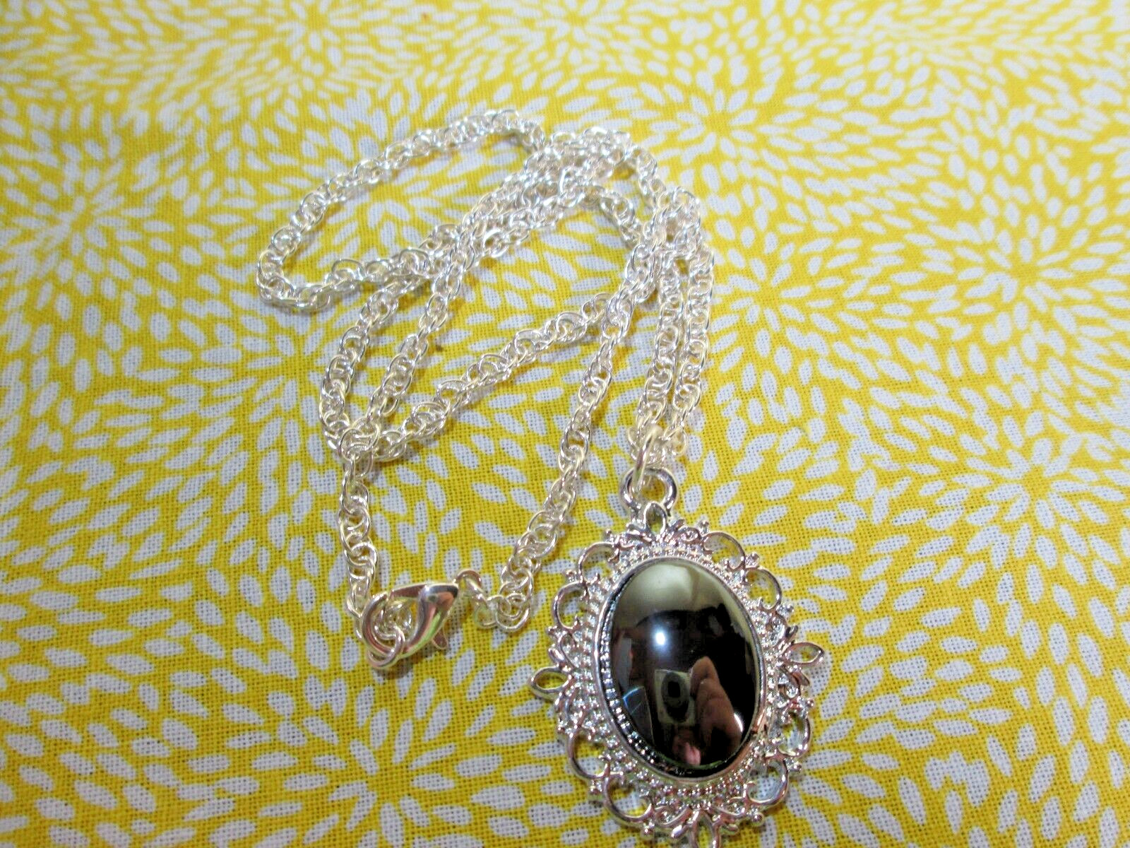 Genuine Hematite Oval Pendant w/ 18″ Silver Plated Rope Chain / N
