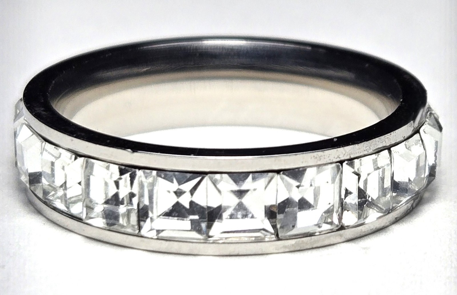 Cubic Zirconia Princess Cut Stones in Invisible Setting Silver Tone Thick Band