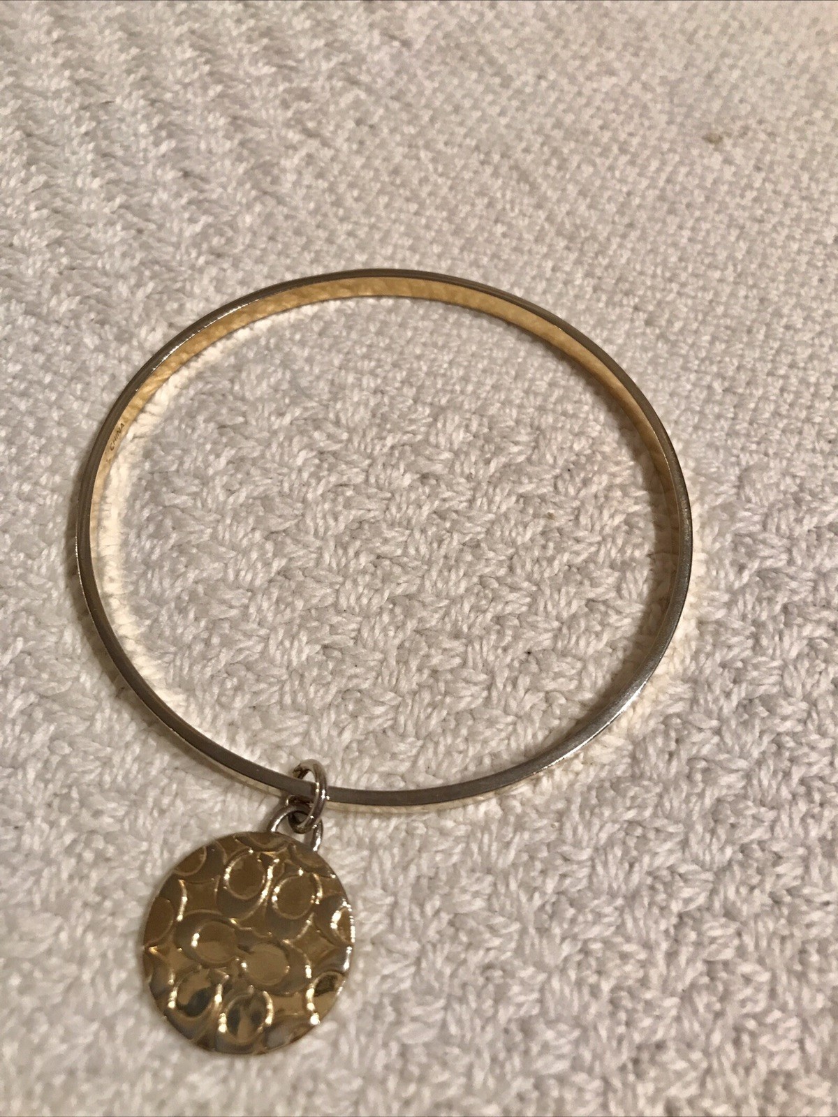 Coach Gold Tone Bangle Bracelet with Signature C Medallion Charm .75”