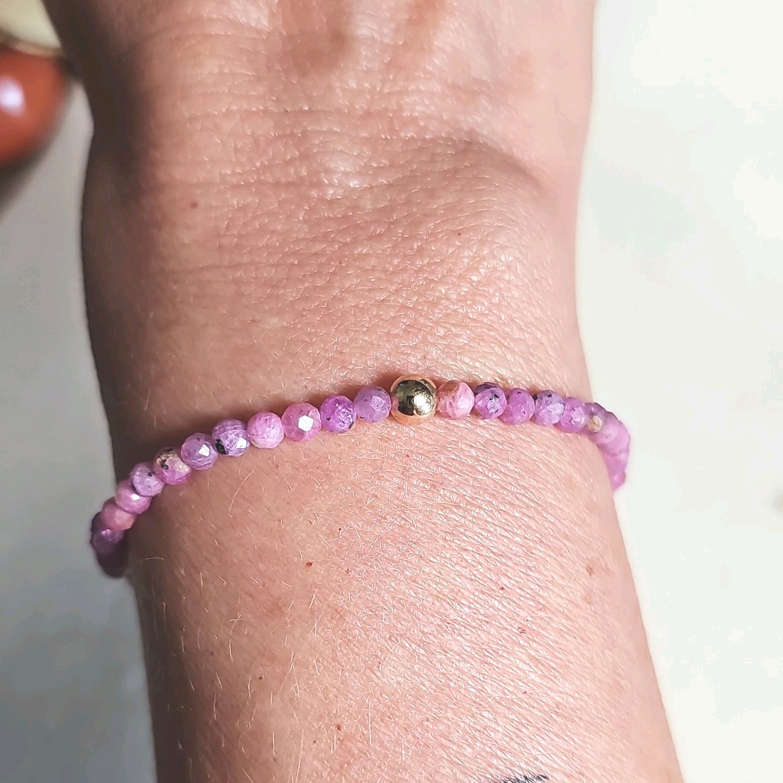 Faceted Ruby Gemstone Bead Stretch Bracelet 10kt Gold Spacer Bead