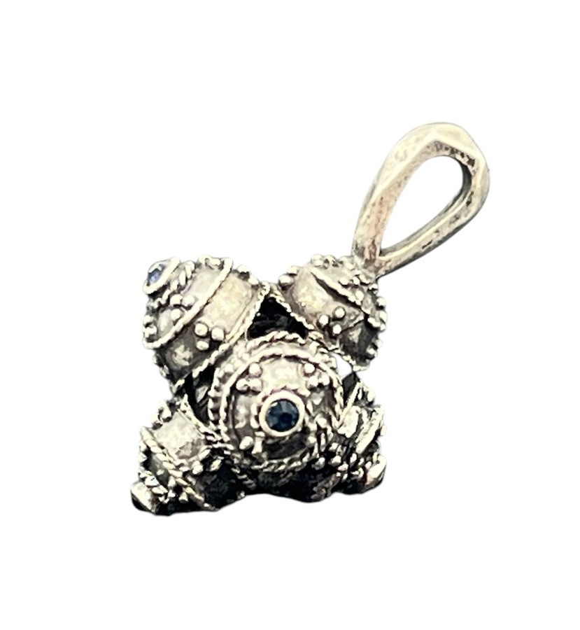 Silver tone blue rhinestone ornate tribal style orb pendant for necklace