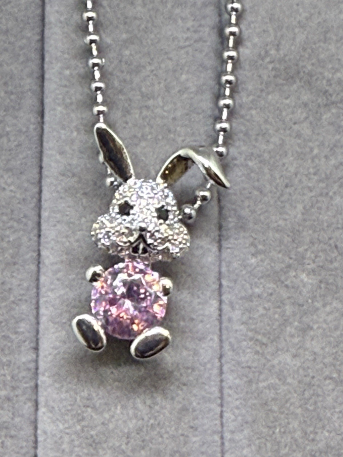 Child’s Rabbit Pend. With Pink. And Wht. Zircon And Stain. Steel Chain, 16 In