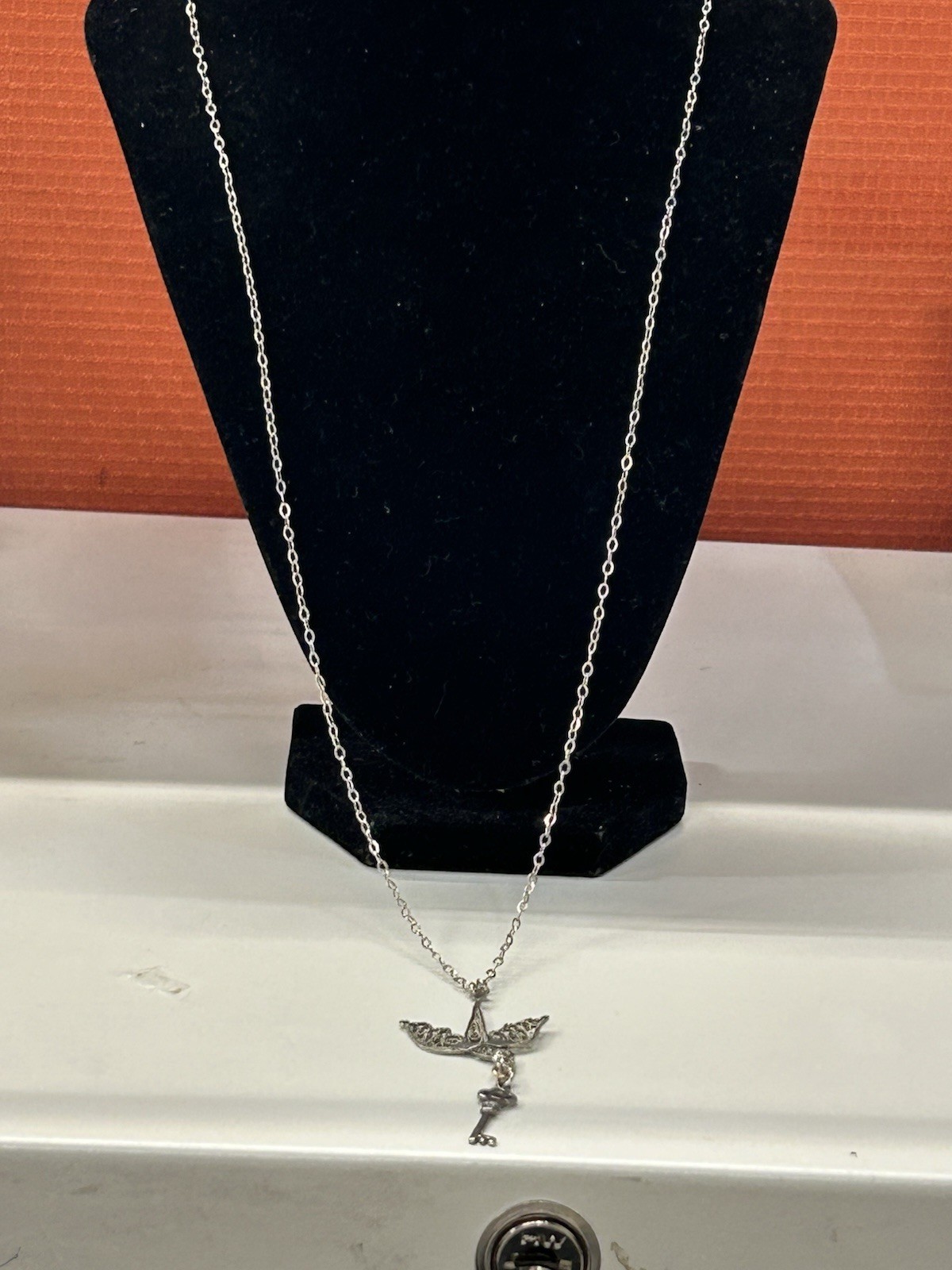 Sterling Silver beautiful and delicate bird with key necklace