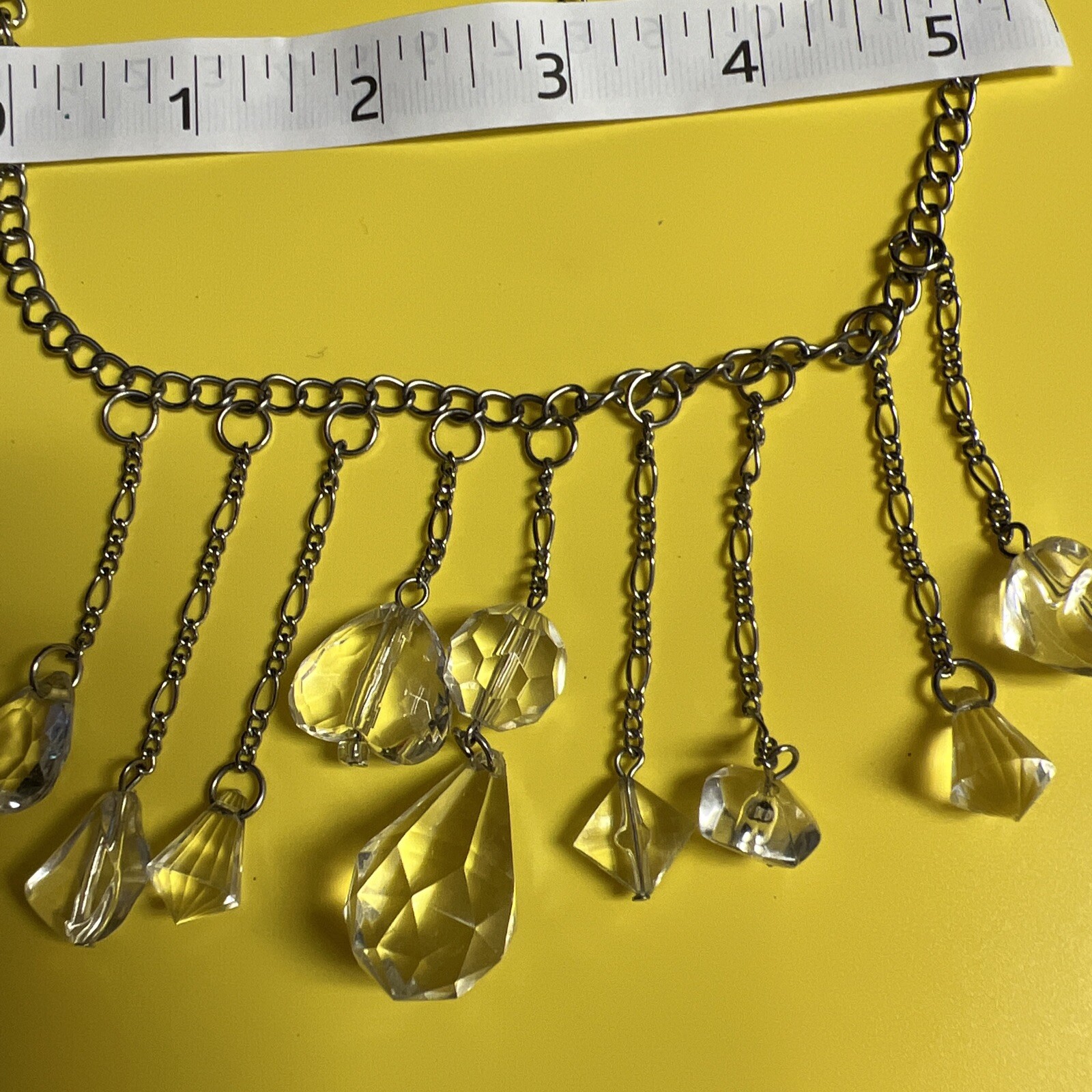 Plastic and silver metal statement necklace