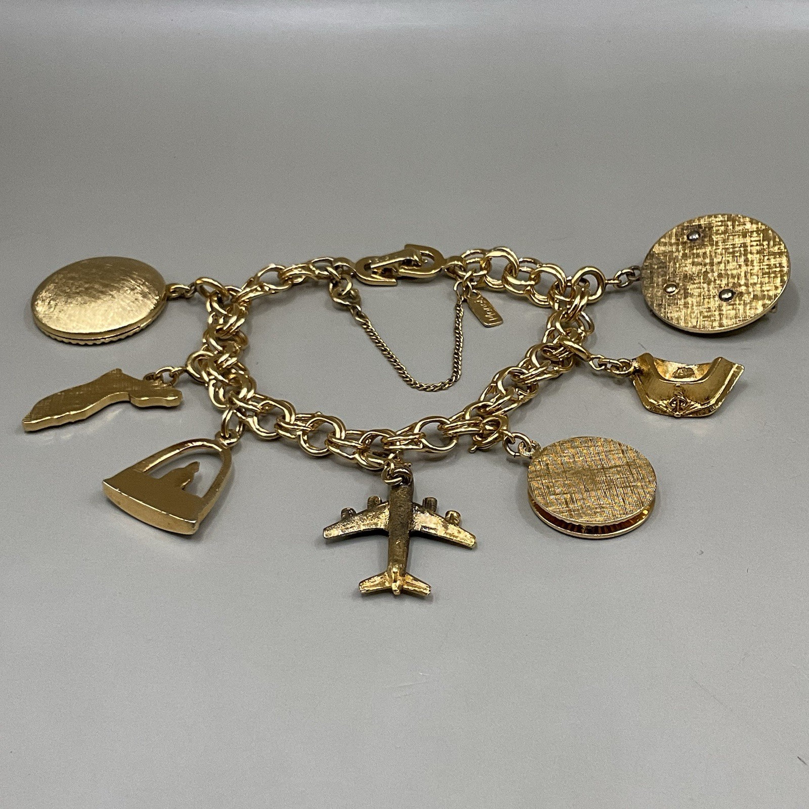 Monet Women’s 7 Charm Bracelet Gold Tone Travel Birthday Puppy Travel Communion