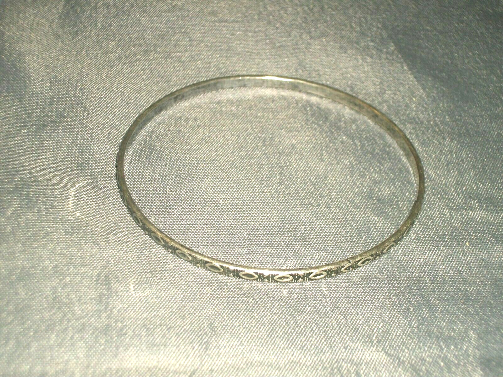 Women’s Bangle Bracelet 2 5/8″ in Diameter Silver Tone Metal with Design