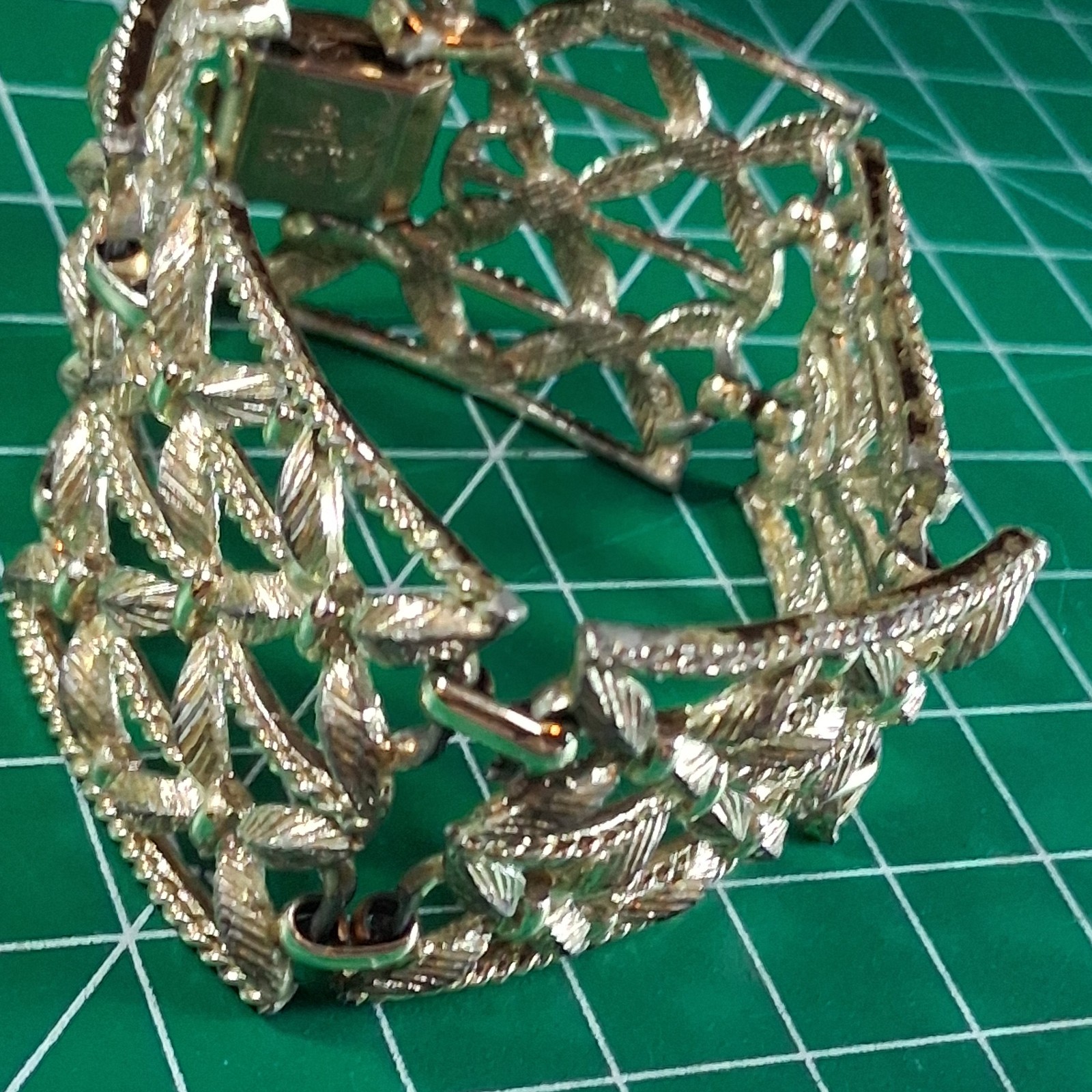 Vintage Cora Silver Tone Wide Band Floral Design Fold Over Clasp Bracelet