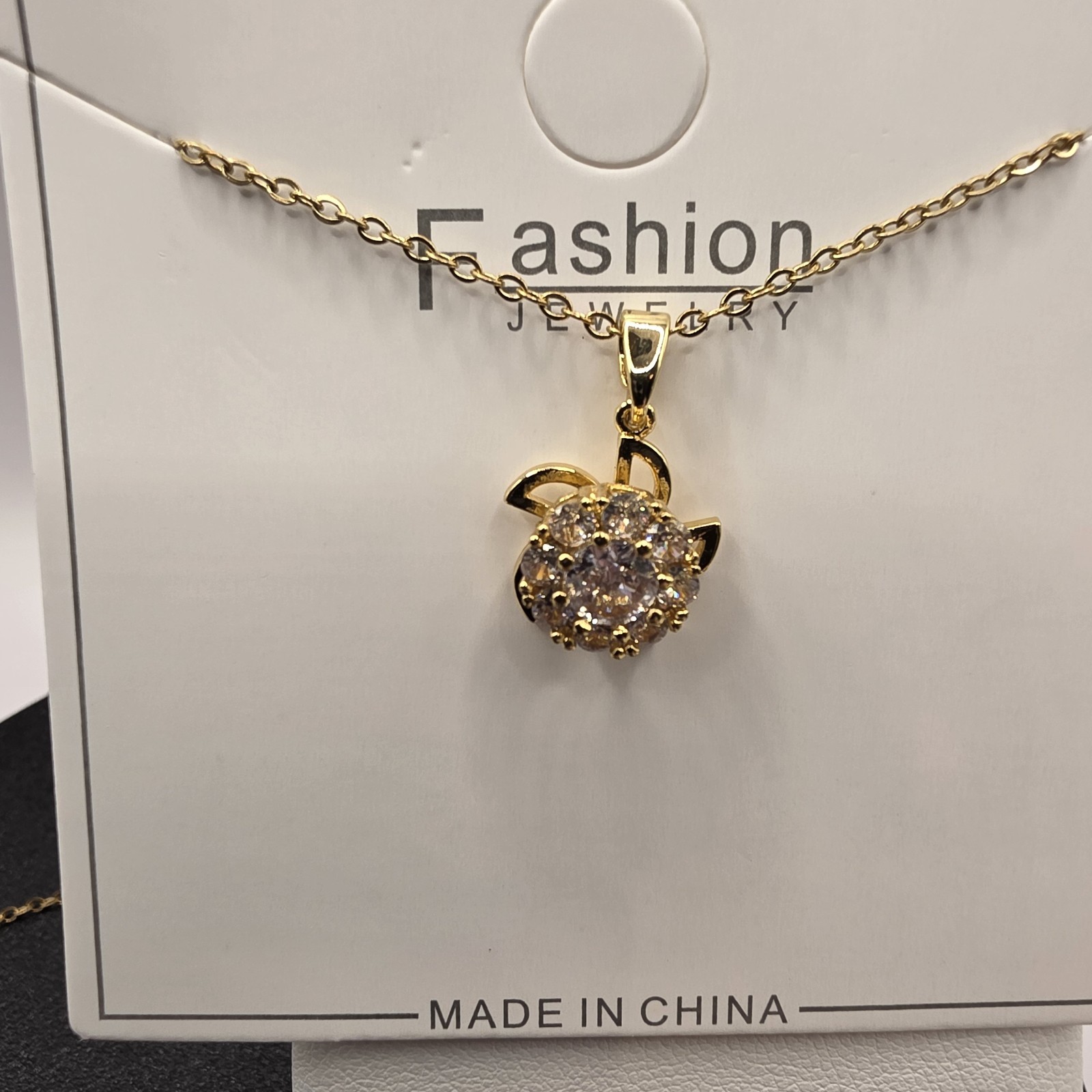Stainless Steel Copper Plated 16″Necklace w/15mm White Cz Flower In Motion…
