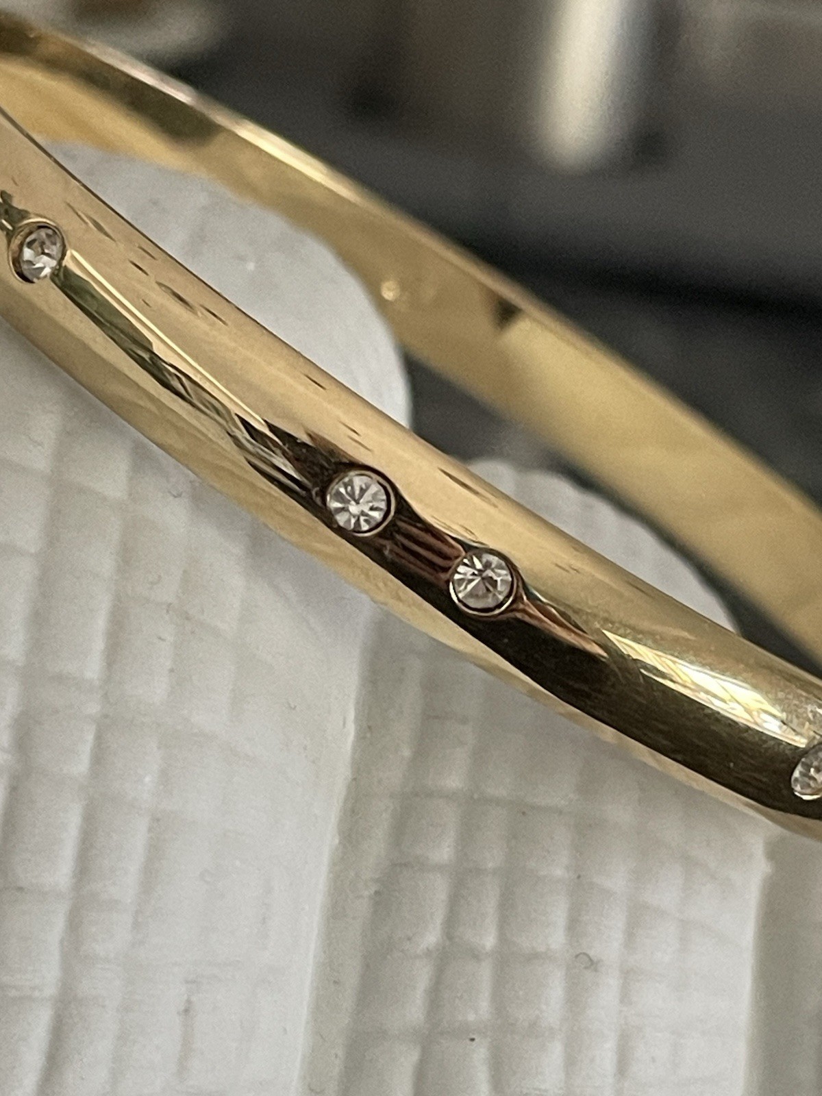 Swarovski Gold Tone Bangle Bracelet with Scattered Crystal Accents Swan Logo