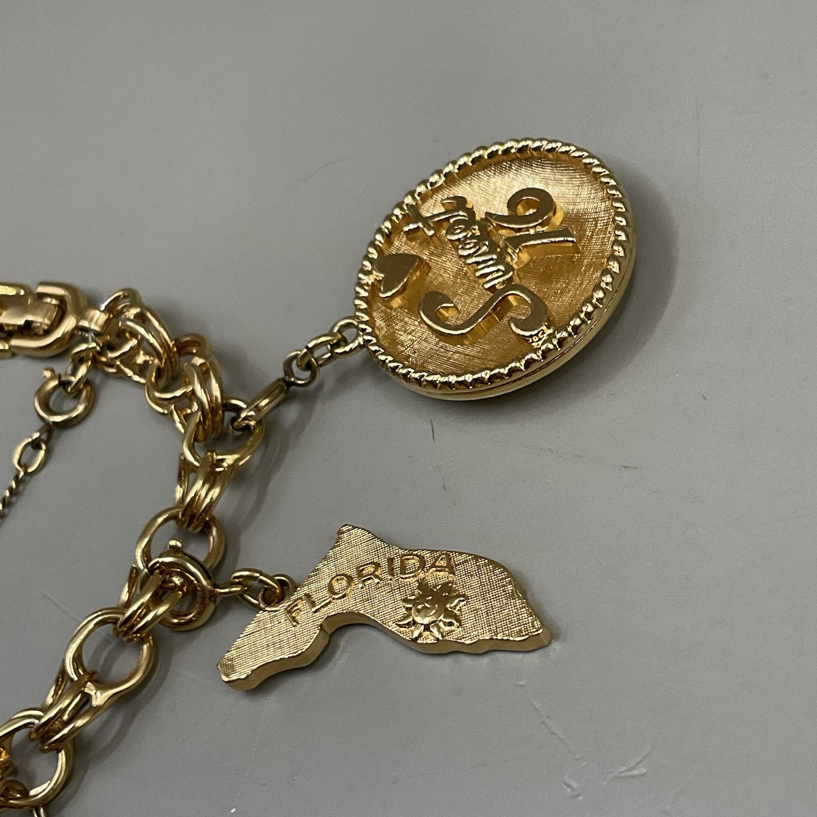 Monet Women’s 7 Charm Bracelet Gold Tone Travel Birthday Puppy Travel Communion