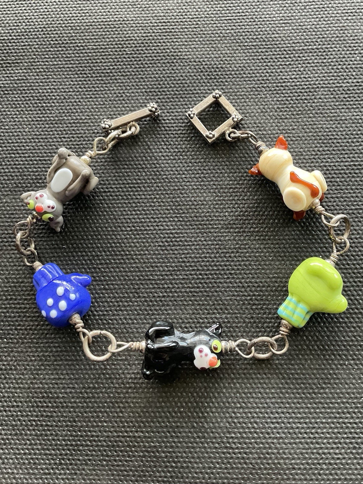 Silver Tone Toggle Bracelet With assorted colorful lampwork glass animal beads