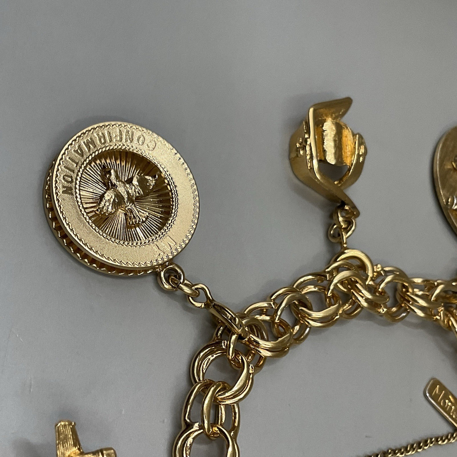 Monet Women’s 7 Charm Bracelet Gold Tone Travel Birthday Puppy Travel Communion