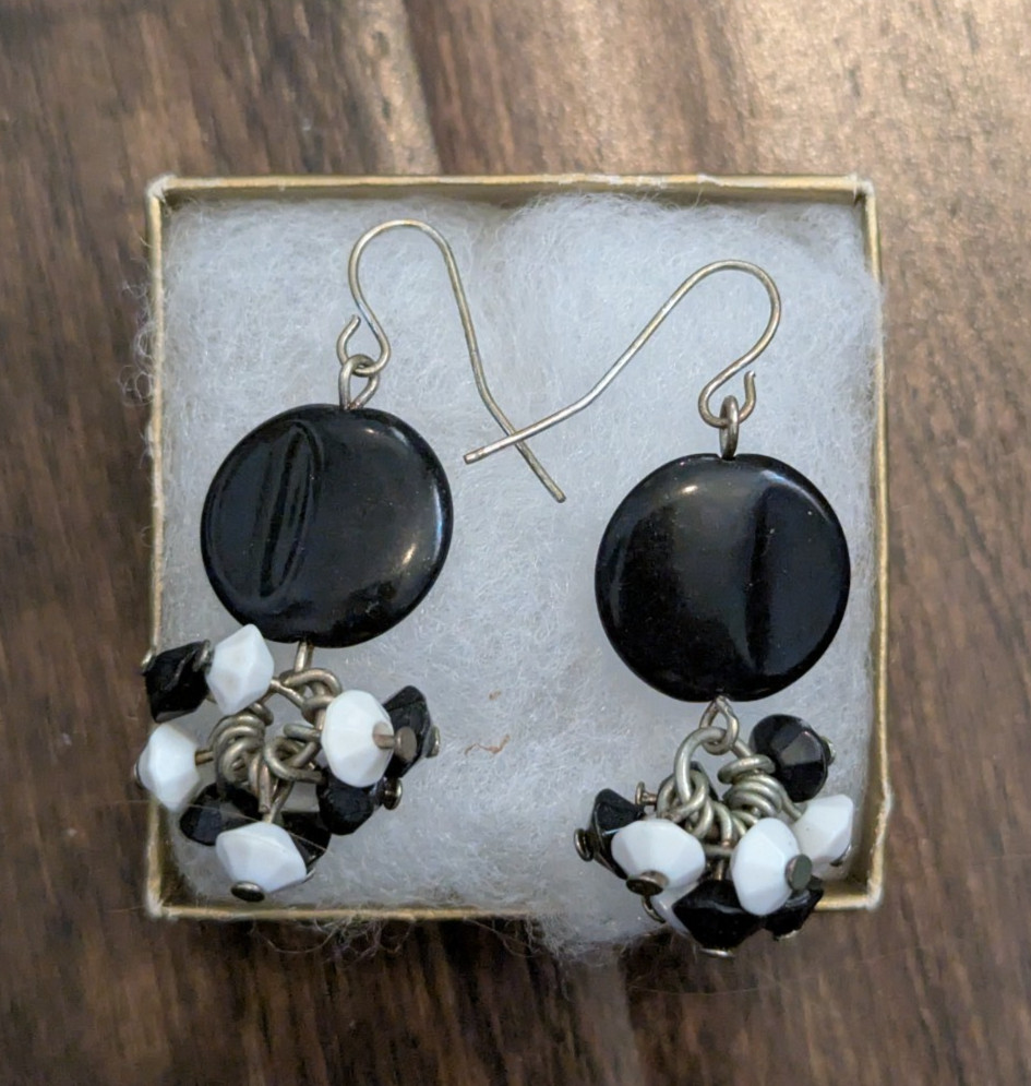 Circular Black Bead with Small White and Black Beads Dangling Below Earrings
