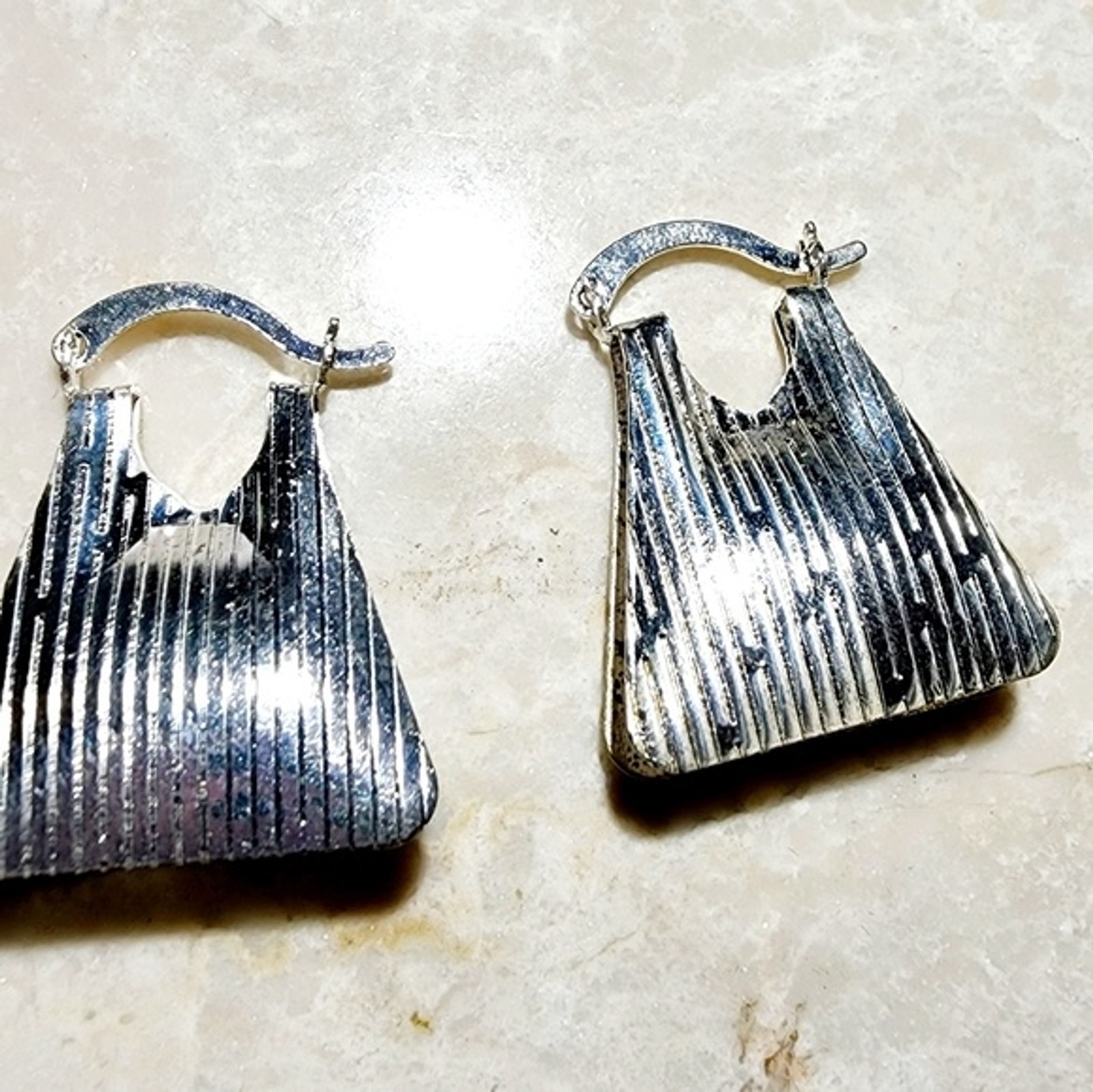 Bright Silver lightweight clasp tote designed earrings