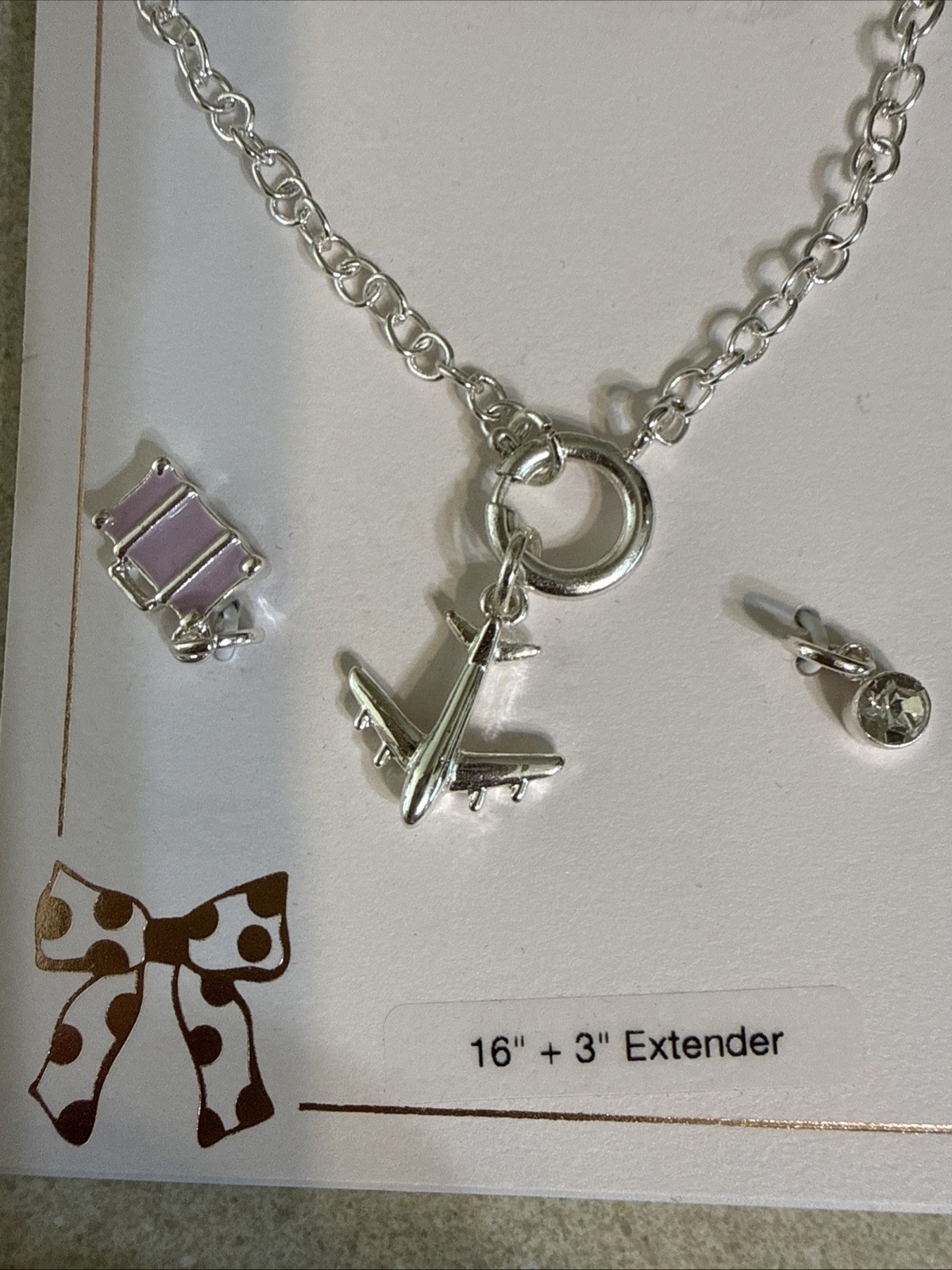 NEW NWT Lauren Conrad silver Tone Airplane Charm Necklace 16″ w/suitcase & gem