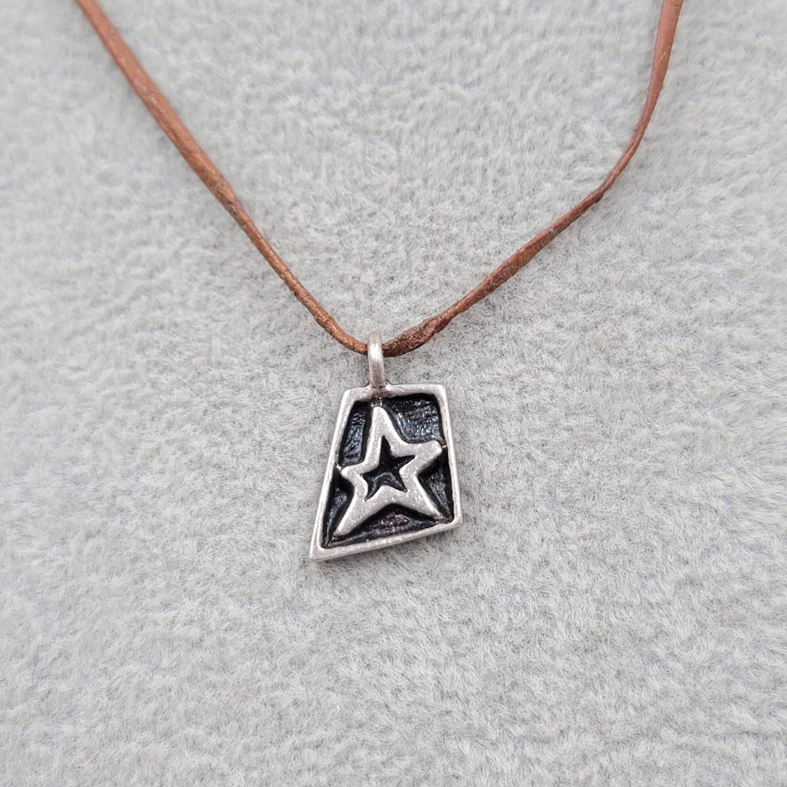 Tak 2007 Star Pendant Necklace Brown Leather Cord Silver tone 16″