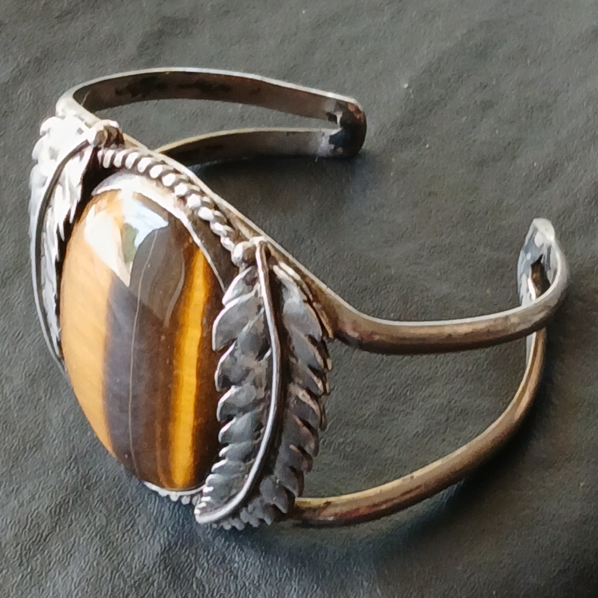 Sterling Silver Cuff Bracelet. Oval Tiger’s Eye Cabochon Framed With Bezel Leaf