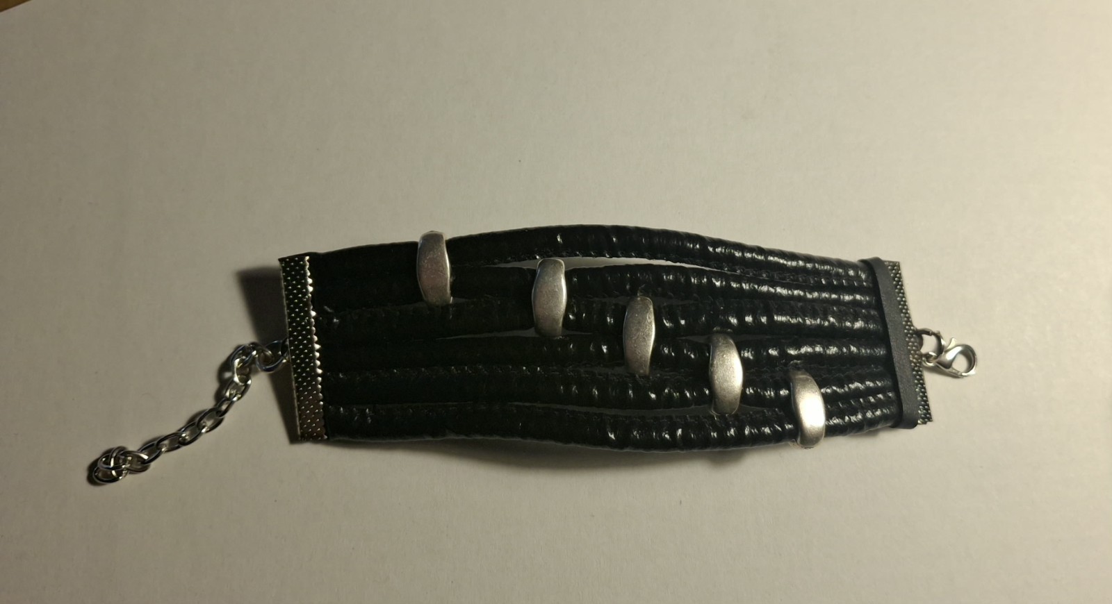 Pre-owned no brand black faux leather or vinyl bracelet w/ silvertone hardware