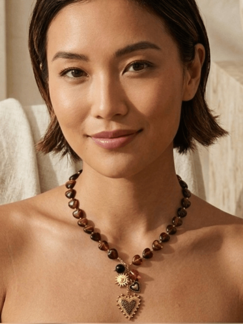 Gold-Accent Brown Heart Bead Necklace with Decorative Charm Drop