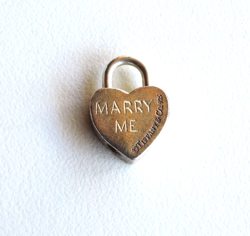 Tiffany & Co RARE “MARRY ME” Silver Heart Lock Charm with matching pouch.