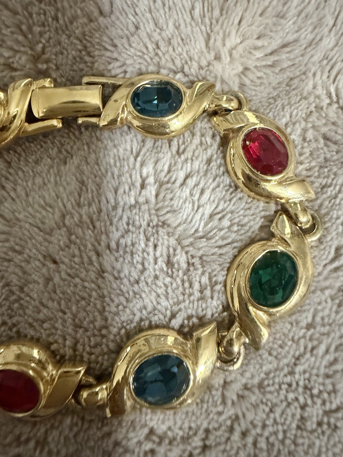Gold Tone ￼ Costume, jewelry bracelet. With Purple Red And Green Colored Stones