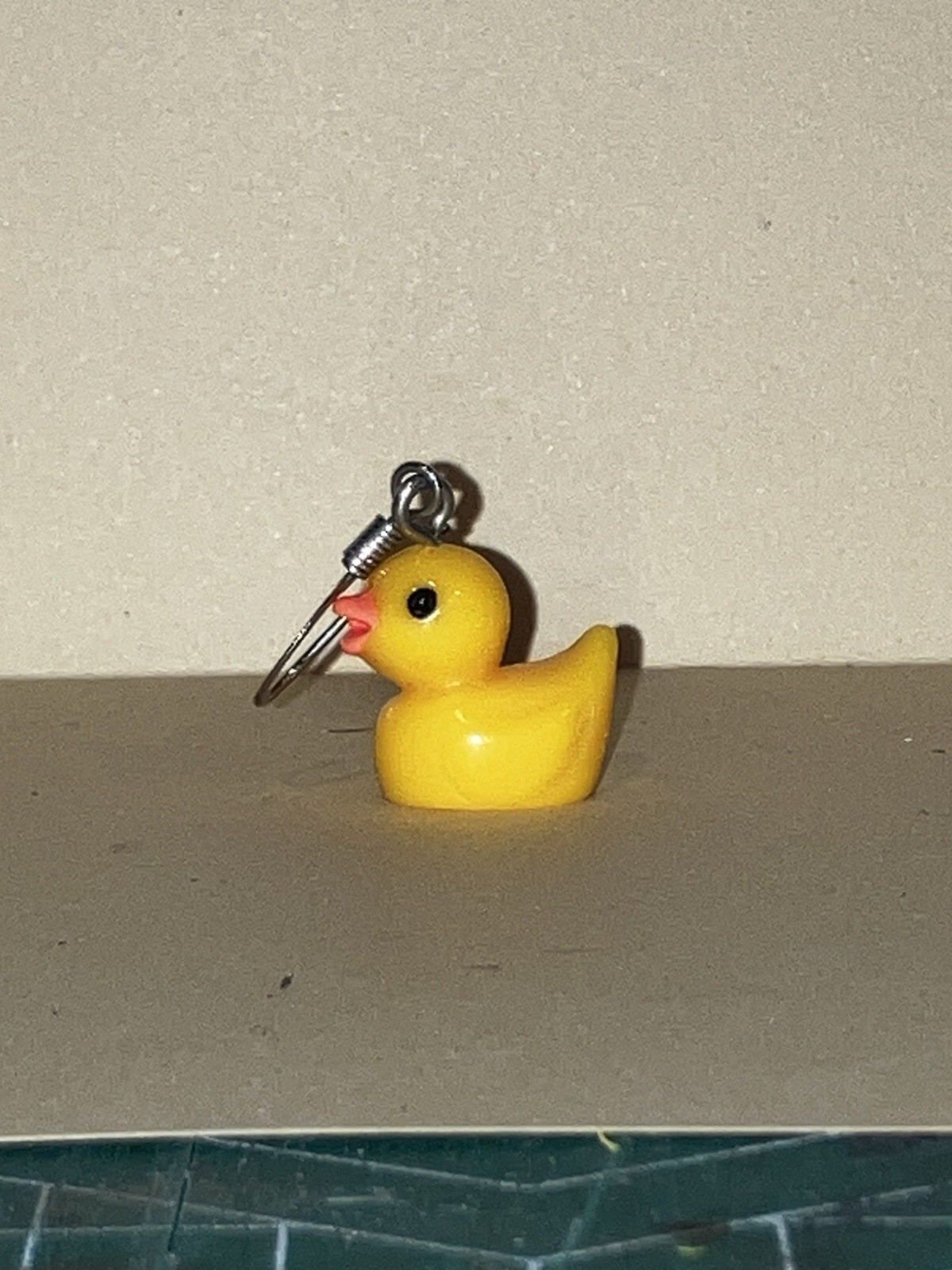 Dangle ducky charm earrings