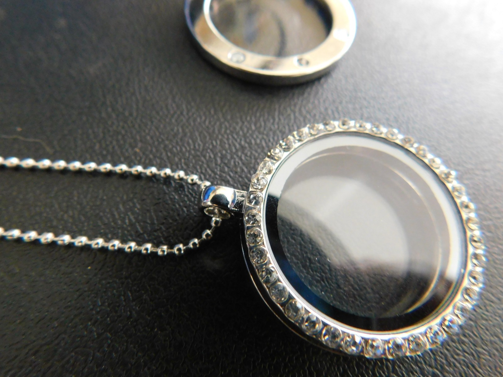 MAGNETIC SILVER LOCKETS W/CIRCLE OF GEMSTONES & CHAIN – 2 FOR $65.00
