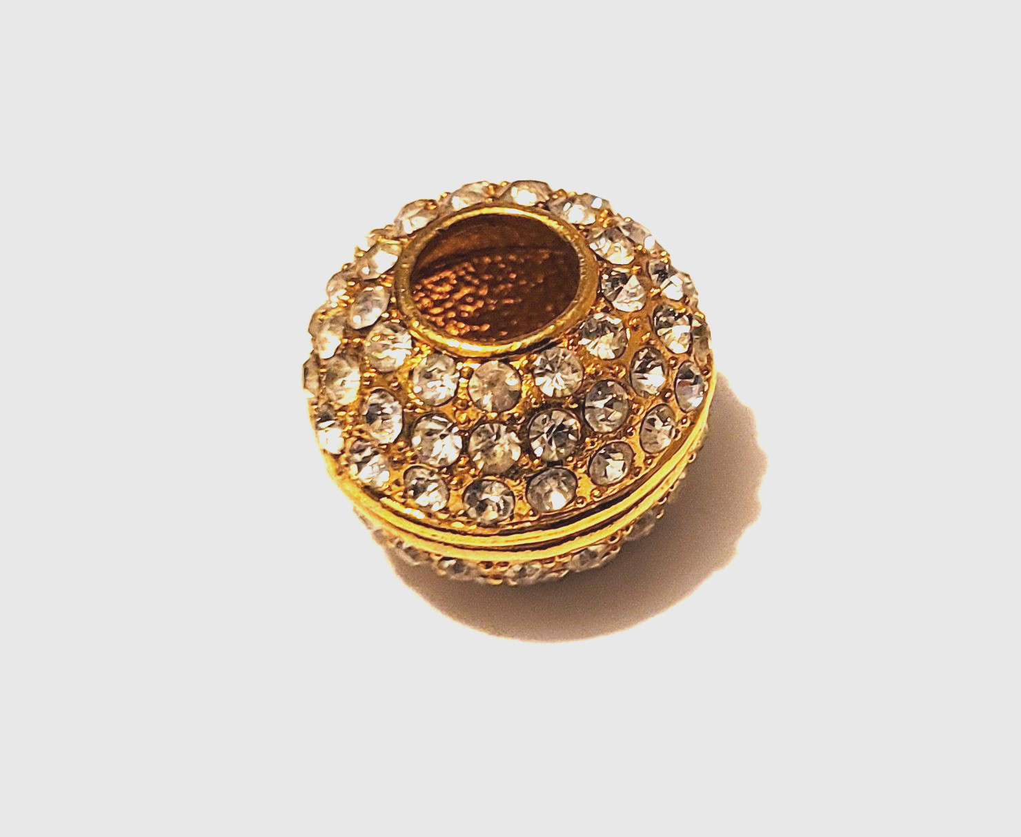 White Rhinestone Gold Tone Orb Pendant