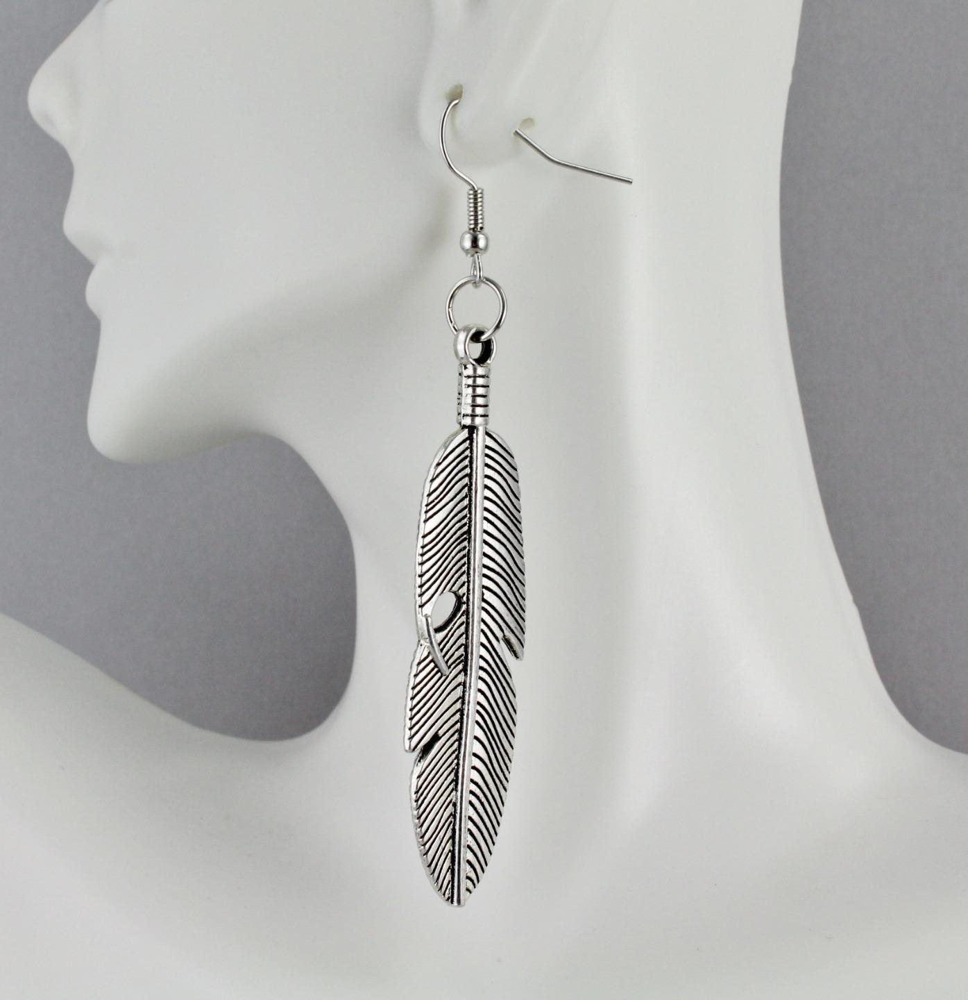 Silver feather earrings dangle metal feather textured 3.25″ long