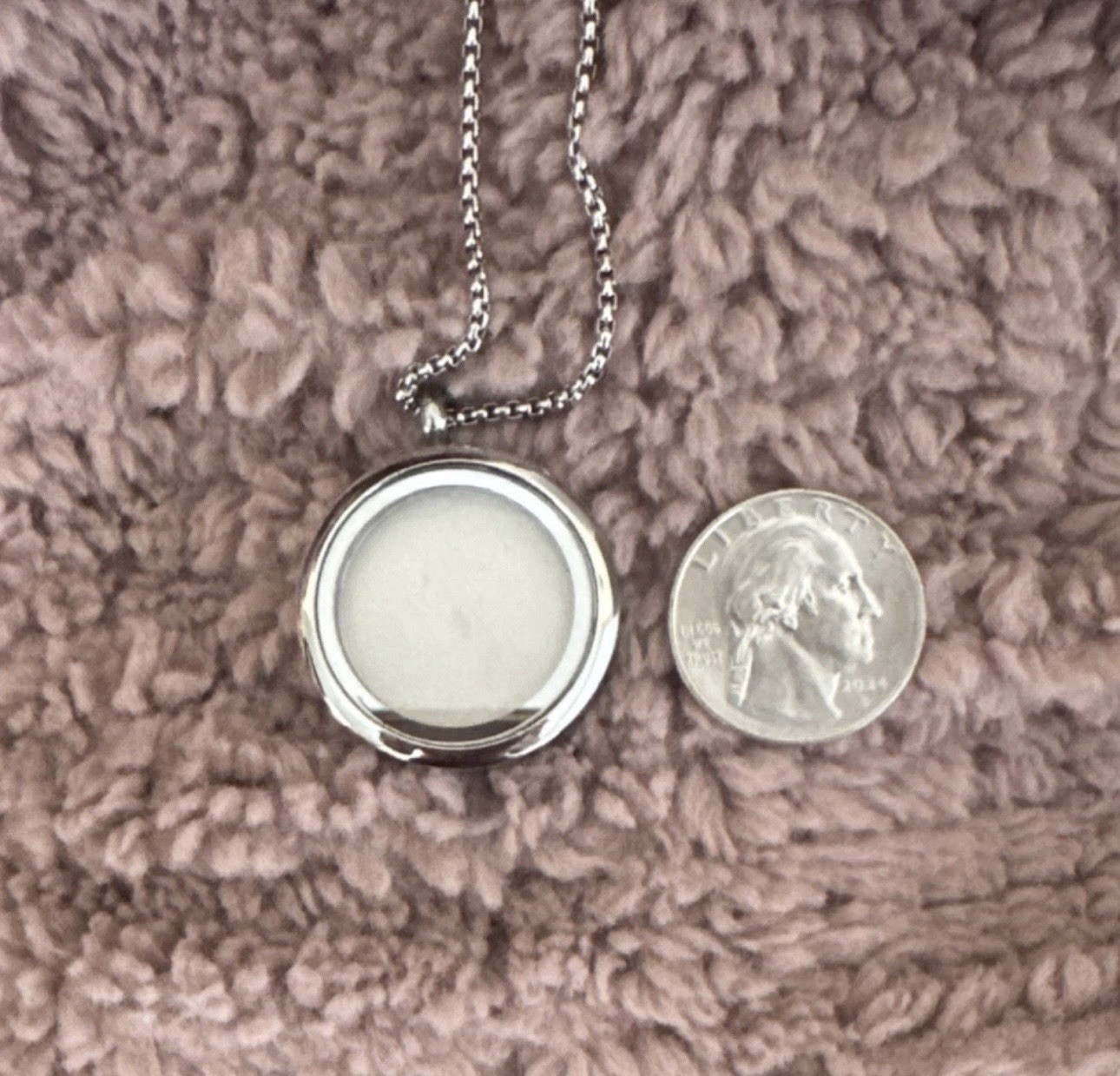 Silver or gold Round Locket Necklace holds a picture and cremation ashes.