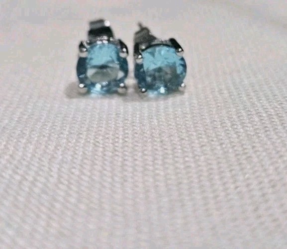 Beautiful Silver and Natural Sky Blue Topaz Stud Earrings