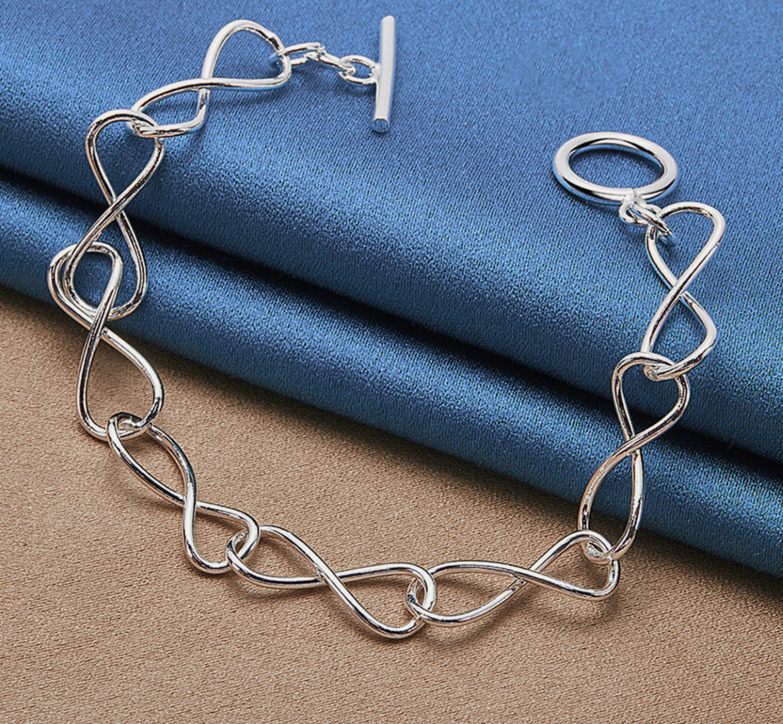 Bracelet 8 in .925 Sterling Silver Wave Infinity Thin Link Chain Toggle Closure