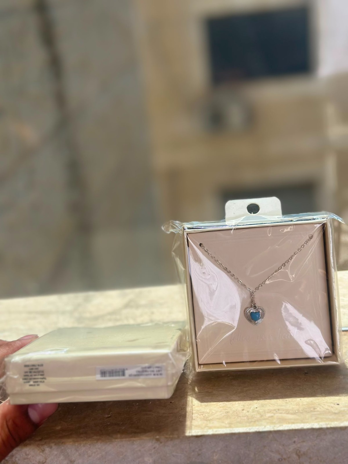 A smooth, rust-resistant silver chain featuring an elegant and attractive blue h