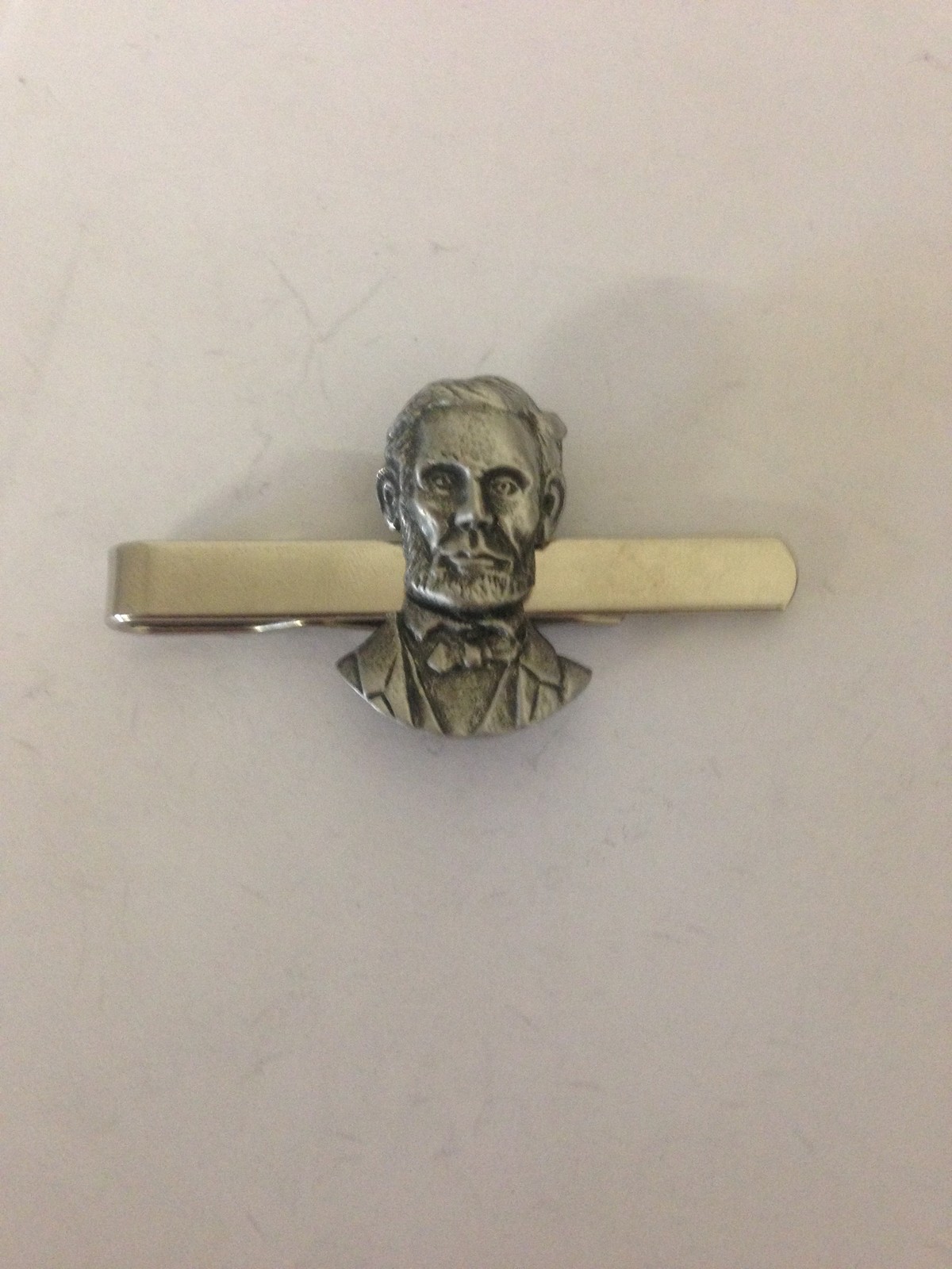 Abraham Lincoln R50 English Pewter Emblem on a Tie Clip (slide)