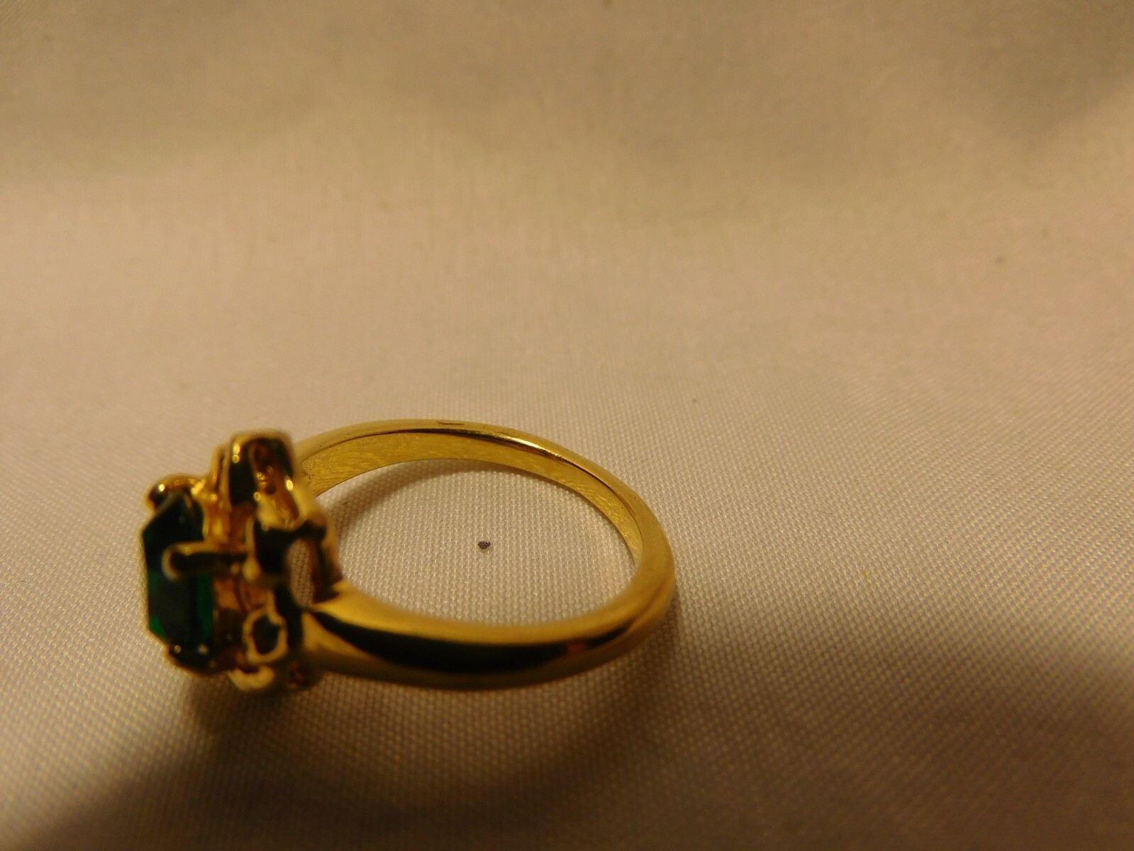 Beautiful Emerald Solitaire, With (2) Small Simulated Diamond Accent Stones