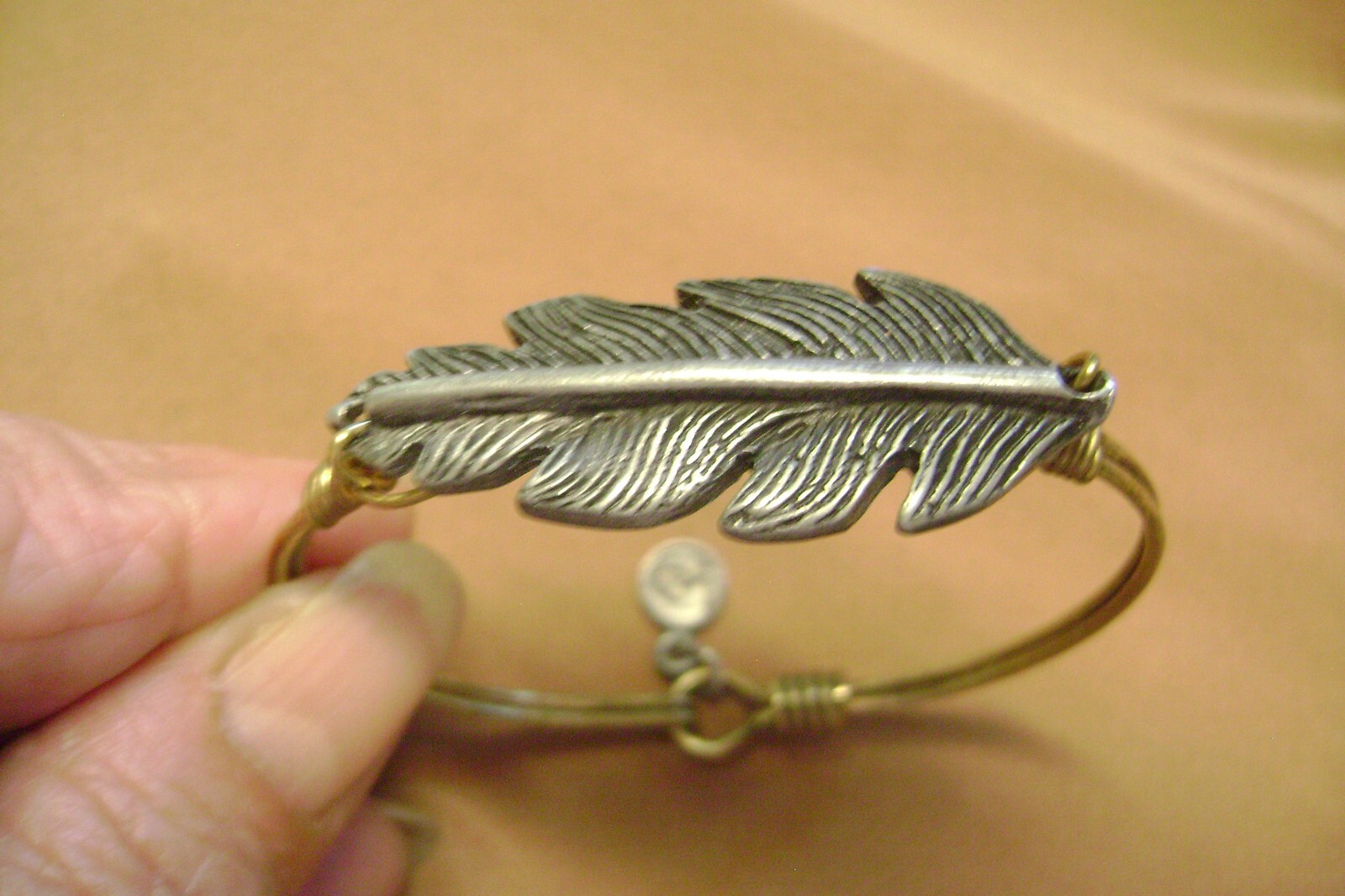 TAGGED LD, LUCA AND DANNIE SILVER LEAF & GOLD TONE BRACELET