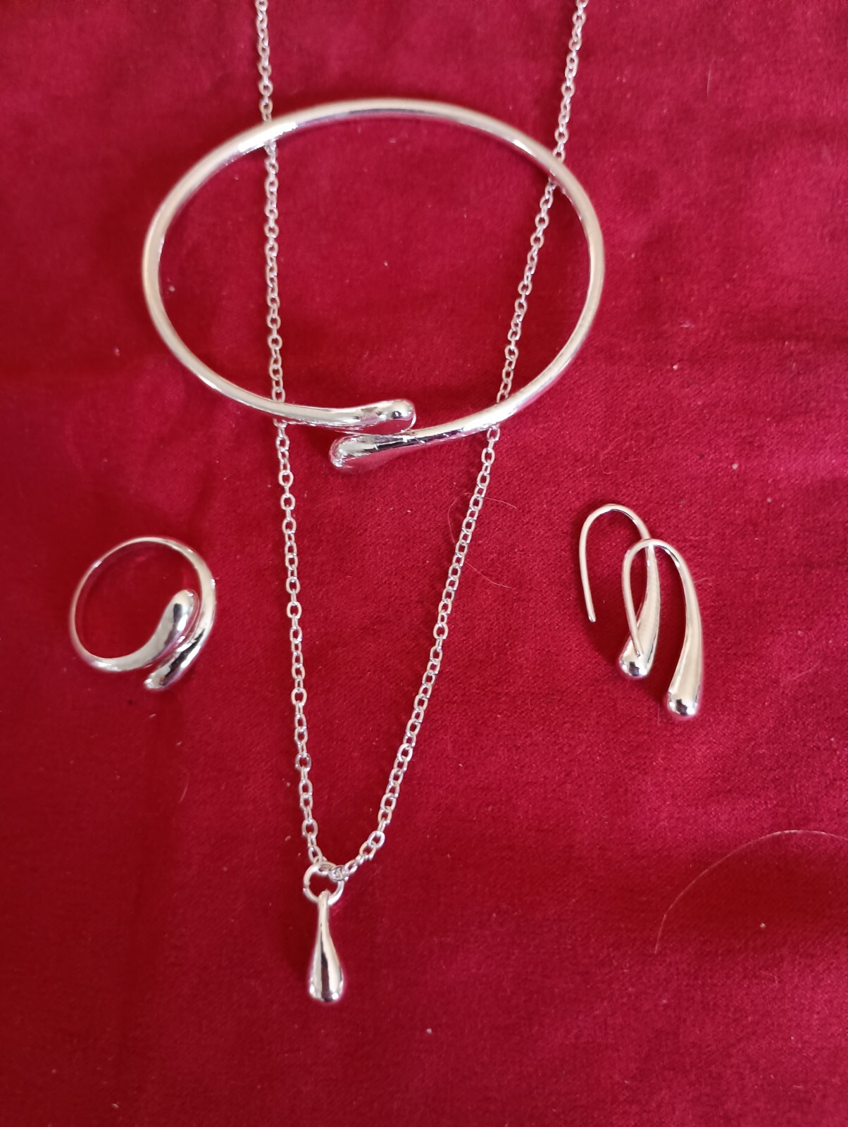 Four Piece Silver Teardrop Jewelry Set. Bracelet, Ring, Earrings, Necklace.