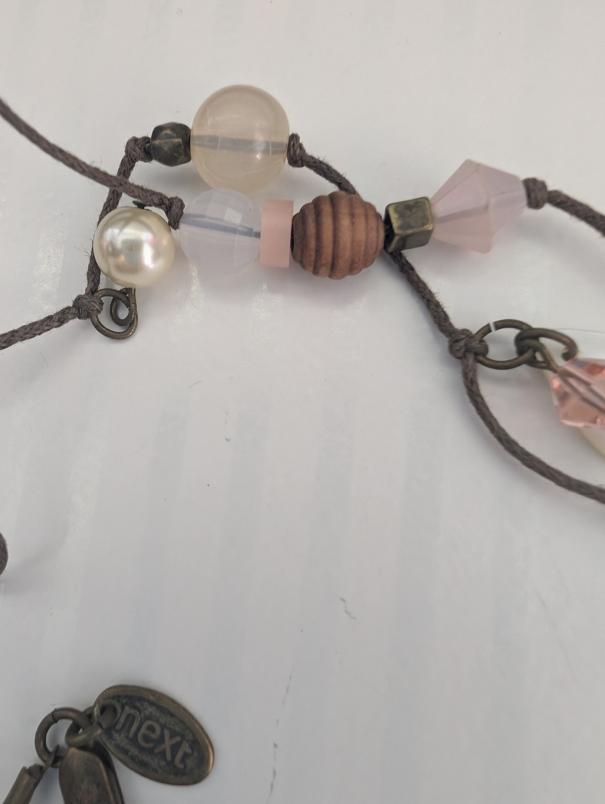 Next Signed Floral Heart Faux Crystal Pearl Wood Beaded Tassel Pendant Necklace