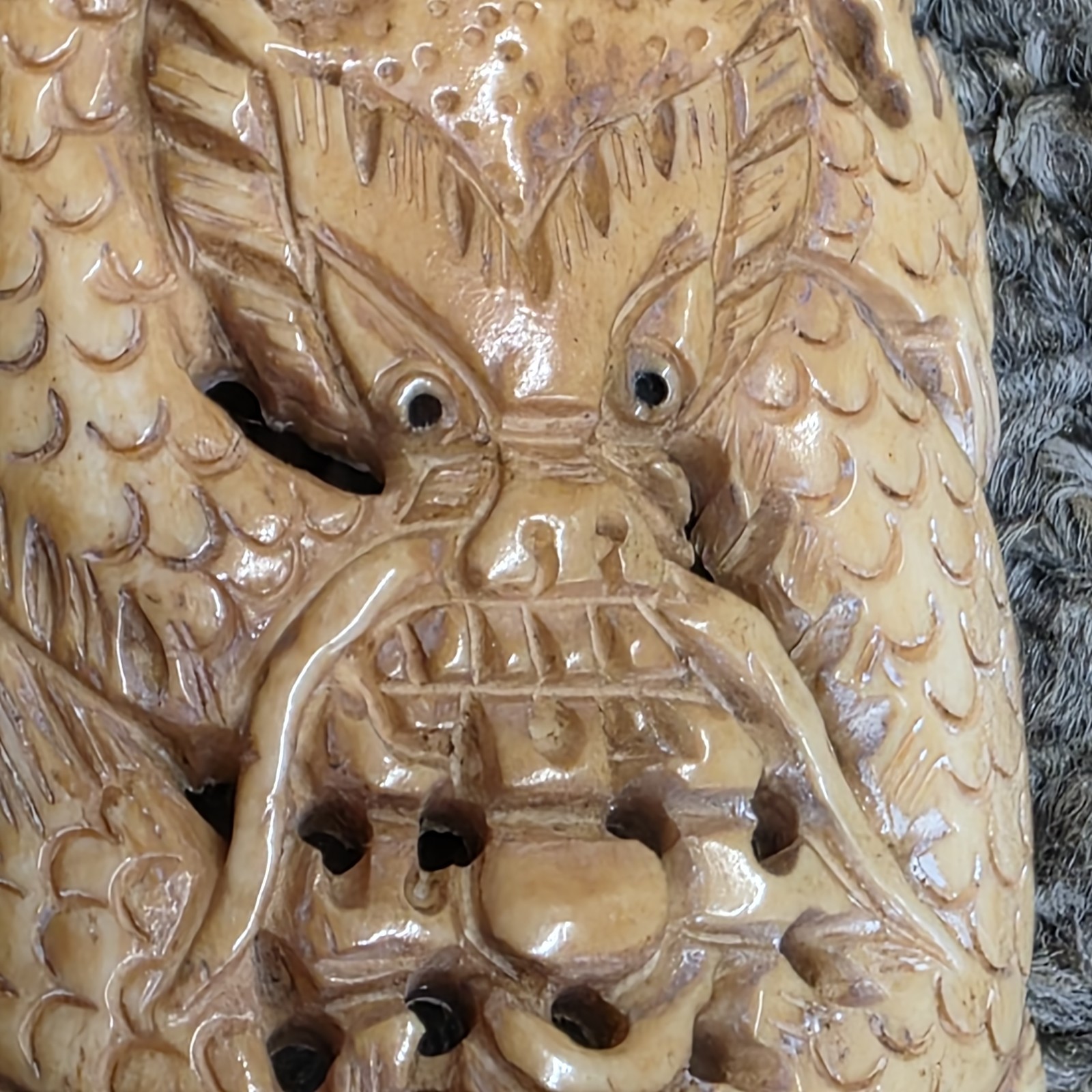 vigorous cow bone carved dragon pendant