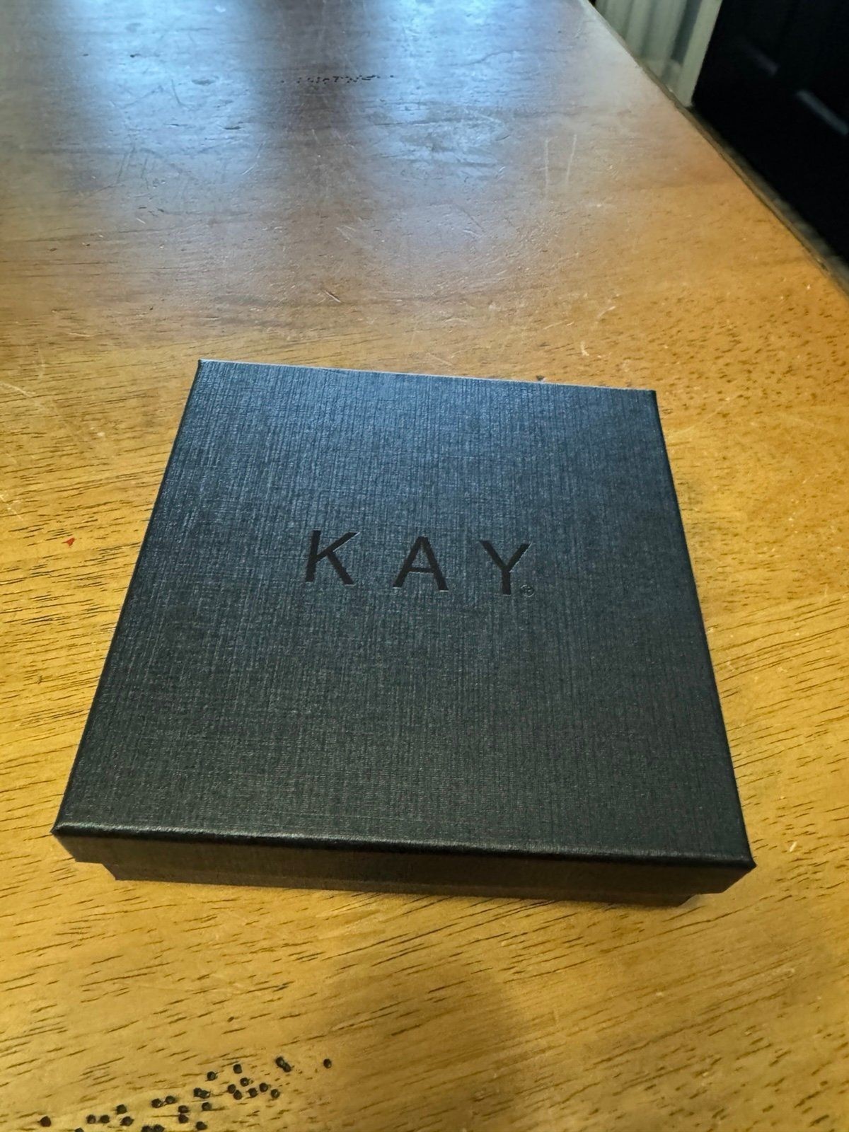 Kay Jewelers presentation box set, featuring a black branded box, a velvet pouch