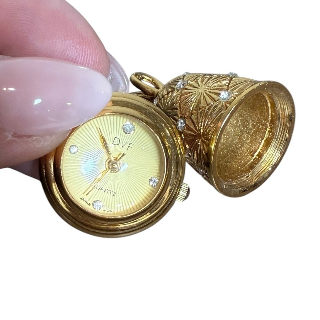 Diane Von Furstenberg DVF Necklace Clock Watch Pendant Gold Starburst Jewelry