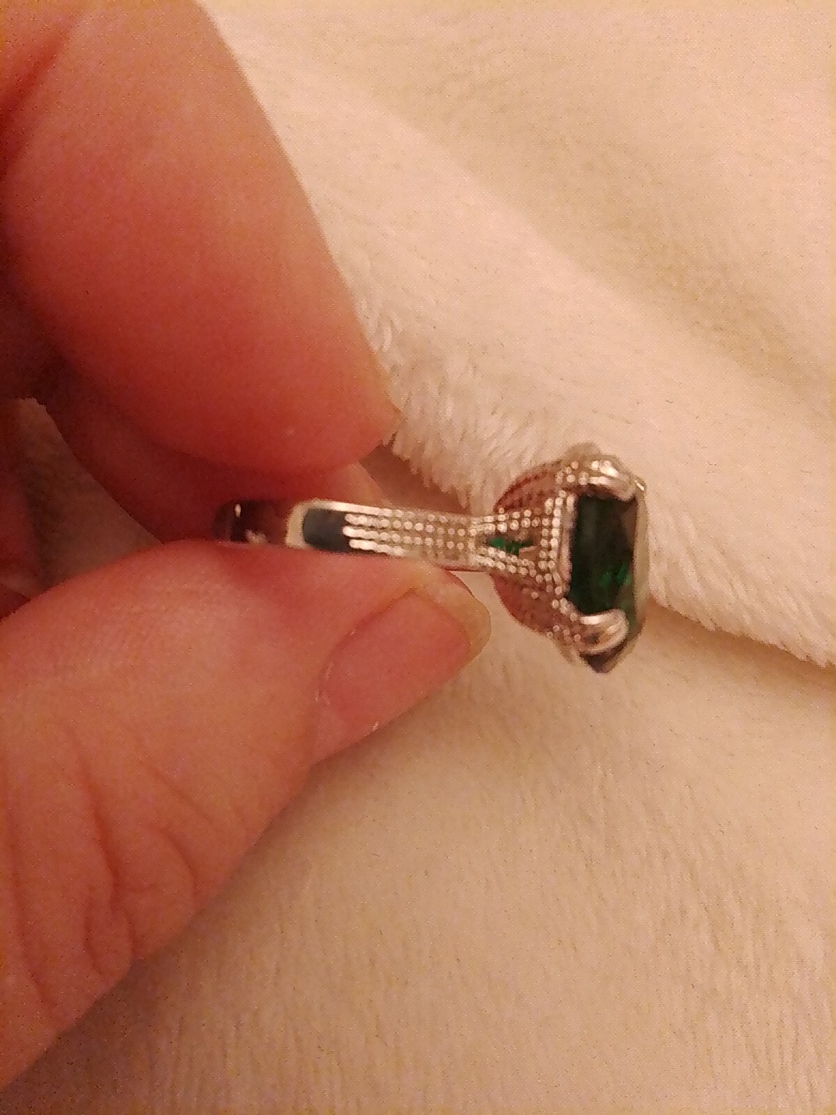 SizeUK J and USA 4.5 Possibly silver Green oval cut claw set ring