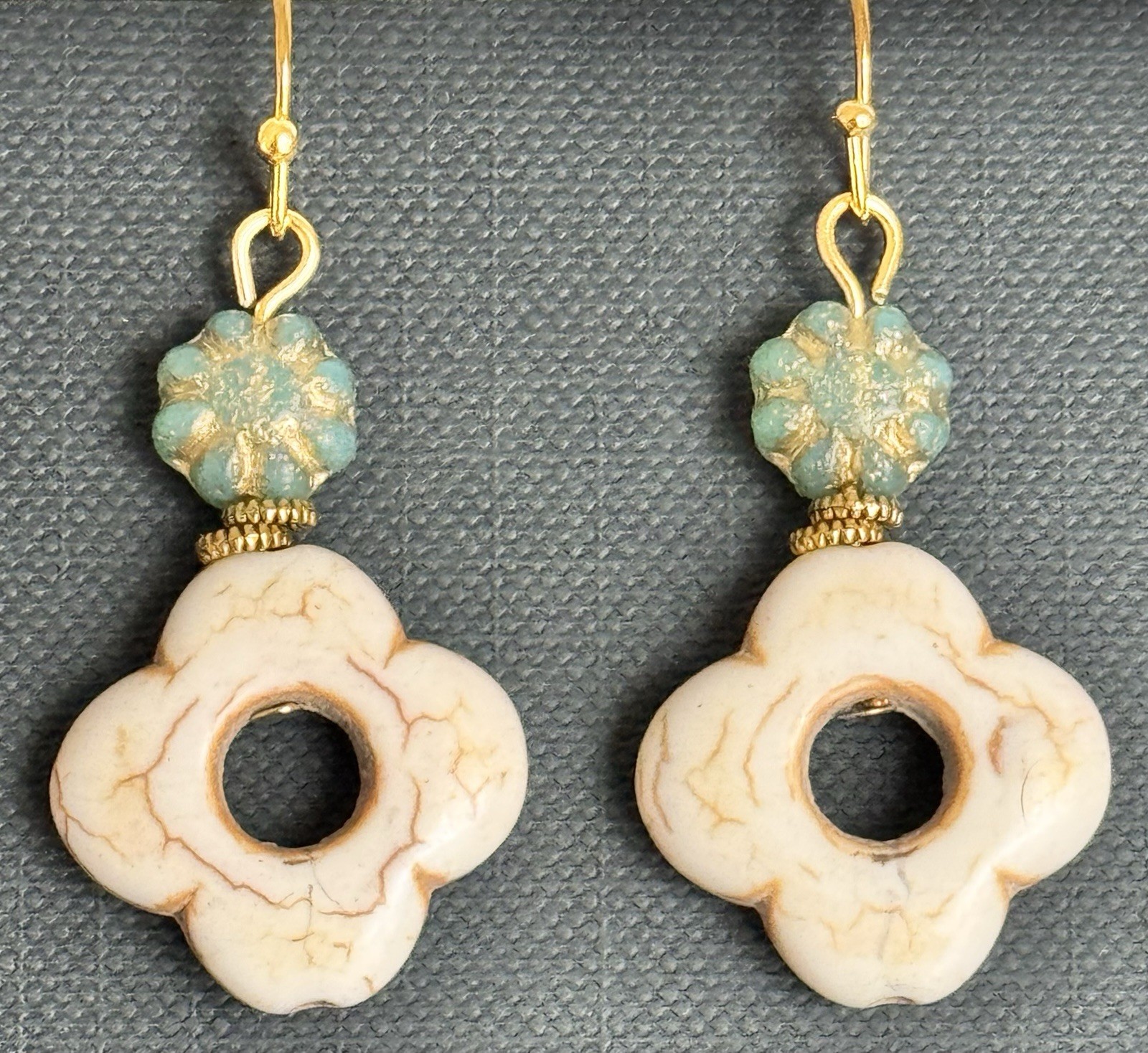 Gold with Green Glass Bead and Ivory Howlite Flower. Clover