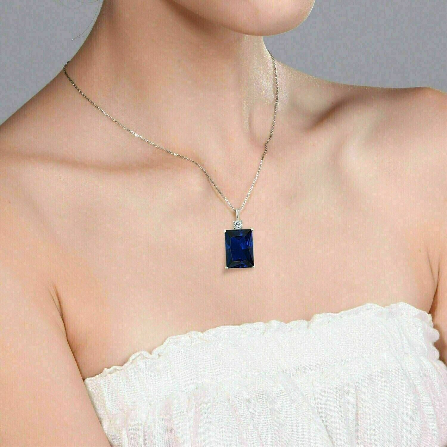 4.00Ct Emerald Cut Simulated Sapphire Lovely Charm Pendant 14K White Gold Plated