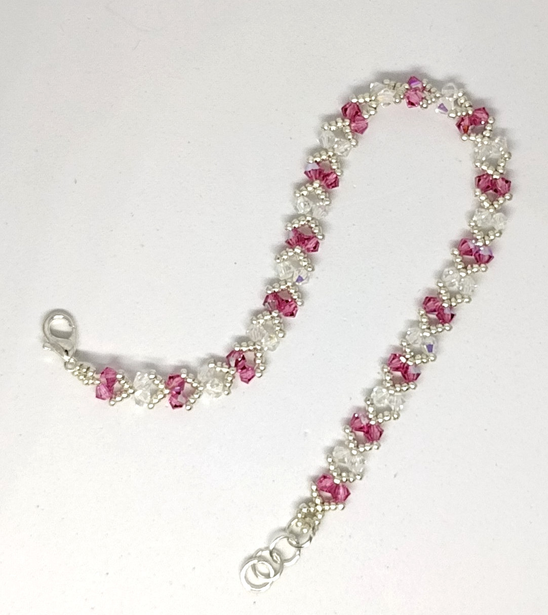 7-inch Bracelet 3mm Crystal Pink/White Sparkly Bicone Beads/Silver Miyuki Beads.